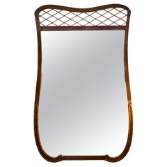 Vintage curved wood frame mirror with lattice detail, mid-century modern