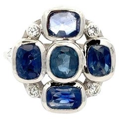 Bague grappe vintage en or, saphir bleu taille coussin et diamants