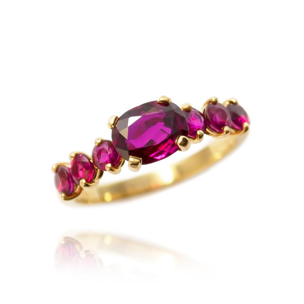 This charming, vintage ring features a 1.06 carat cushion cut, purplish-red ruby set with 6, round rubies = 1.40 ctw. Fun to stack or wear on it's own, this will become your new go-to ring all year long! 

Purchase includes complimentary ring sizing