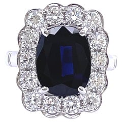 Vintage Cushion Sapphire Diamond Halo Ring