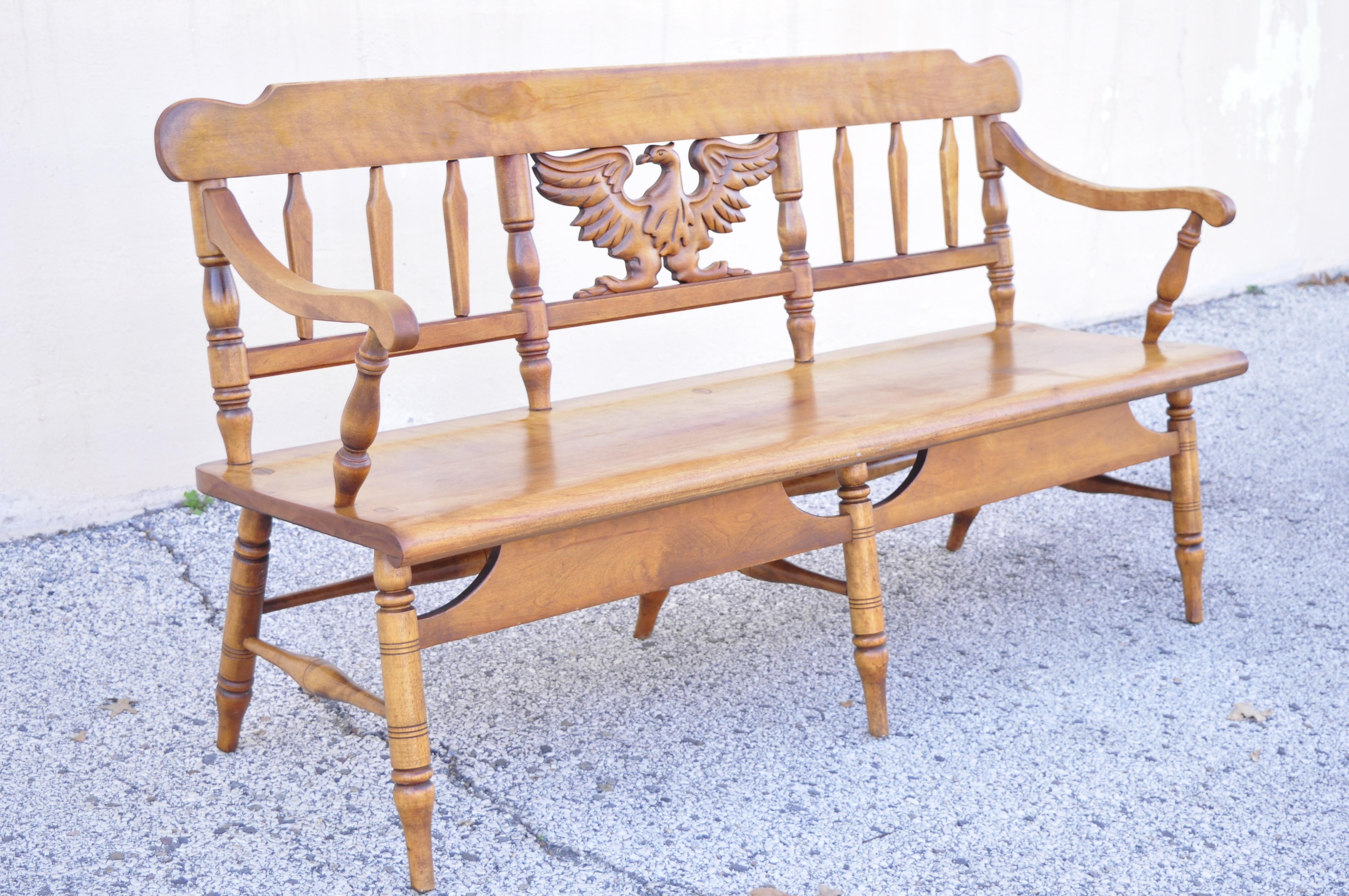 Vintage Cushman maple wood settee bench carved eagle back deacons bench. Item features carved wood eagle, (6) turn carved legs, brass rolling casters, solid wood construction, beautiful wood grain, original label, very nice vintage item, quality