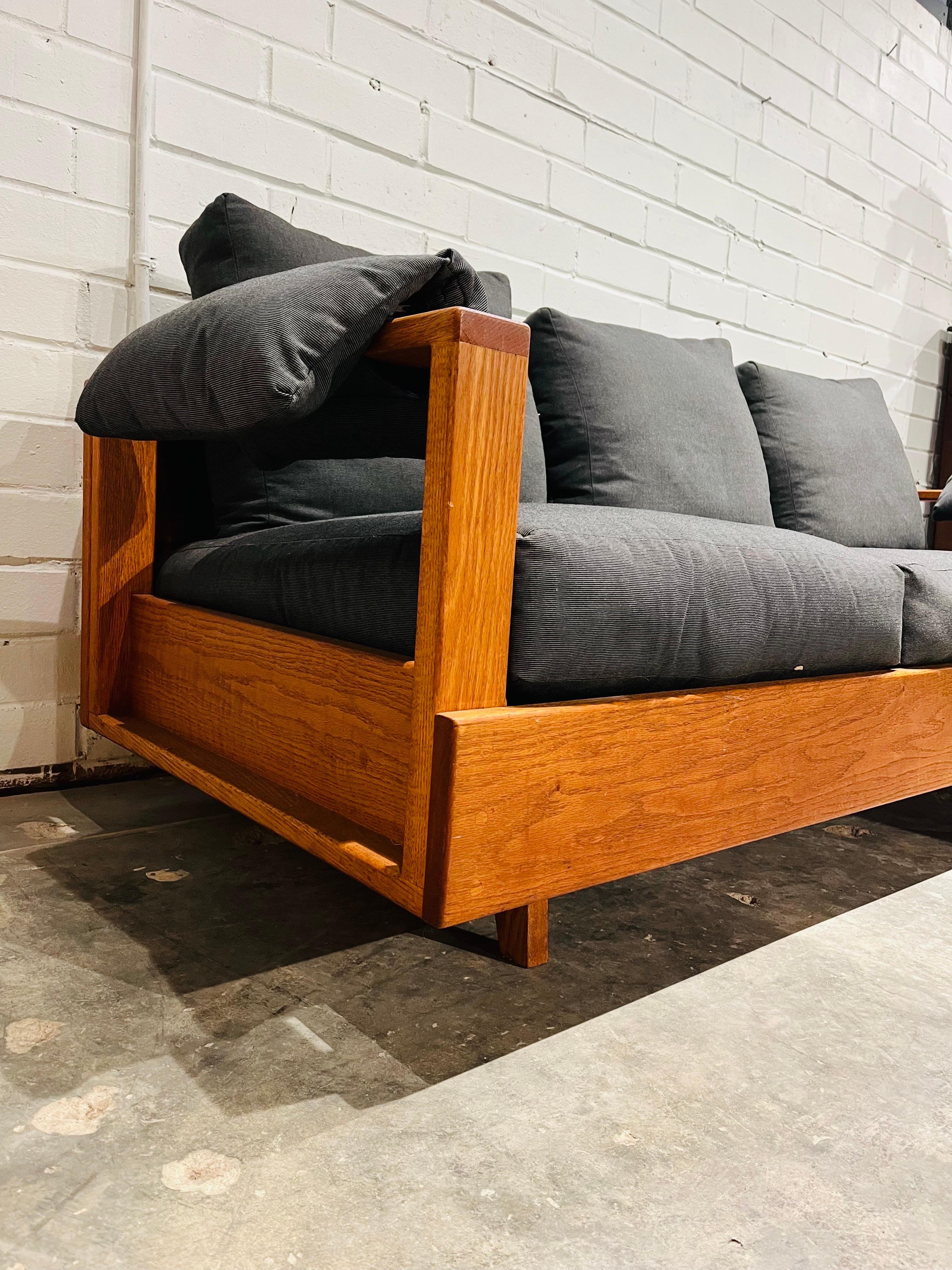 vintage couch with wood frame