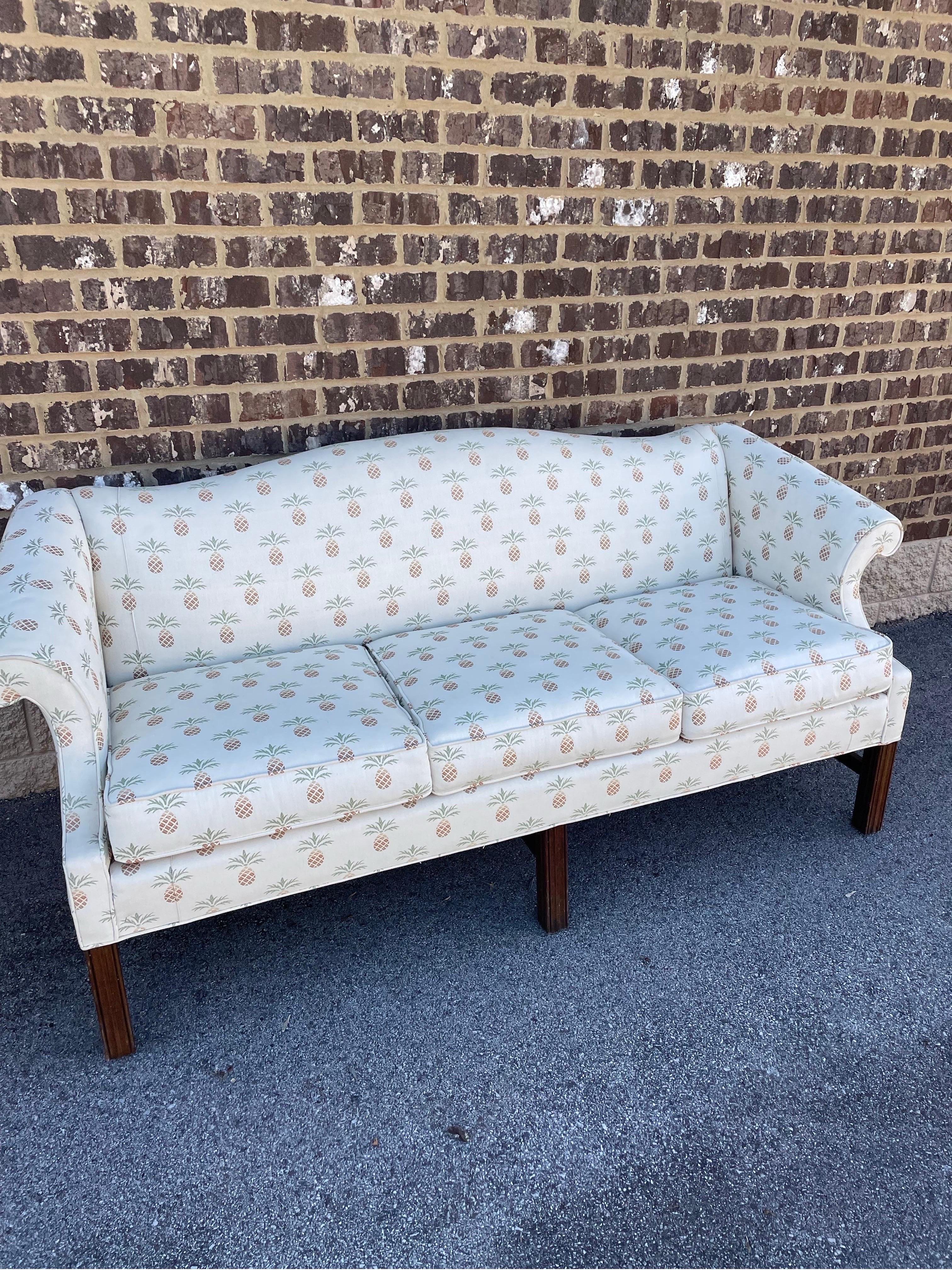 Lovely Chippendale style loveseat/settee with gorgeous pineapple upholstery, by Stateville and Ross of North Carolina. wood is beautiful and in great condition. The fabric is also in good overall condition.

The sofa features superior workmanship --