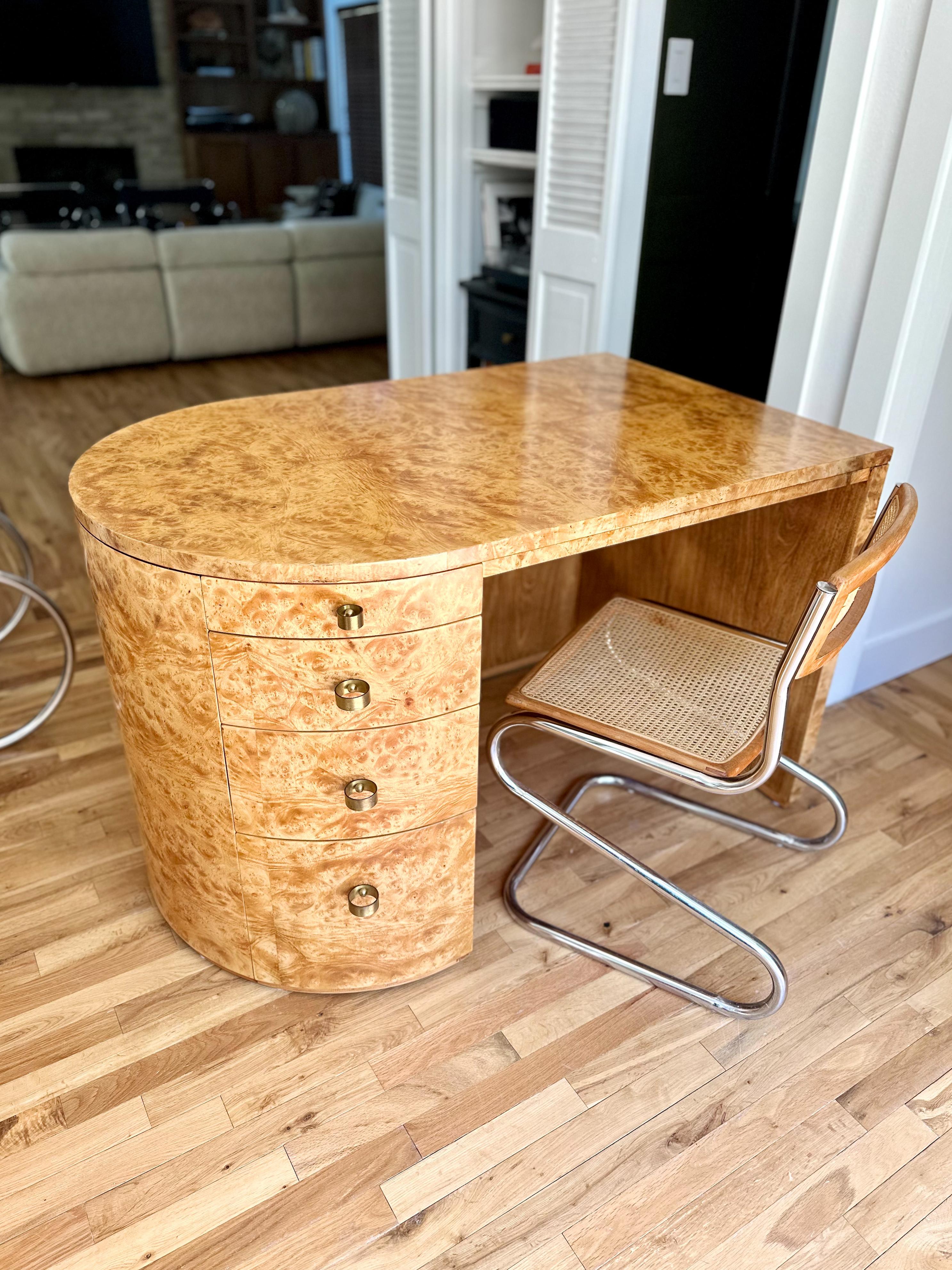 Drop dead gorgeous Art Deco style horseshoe-shaped burl wood desk, meticulously restored and finished from all angles. This vintage, custom-made piece is incredibly solid and built to last. Albeit compact, this is packs a punch and no detail was