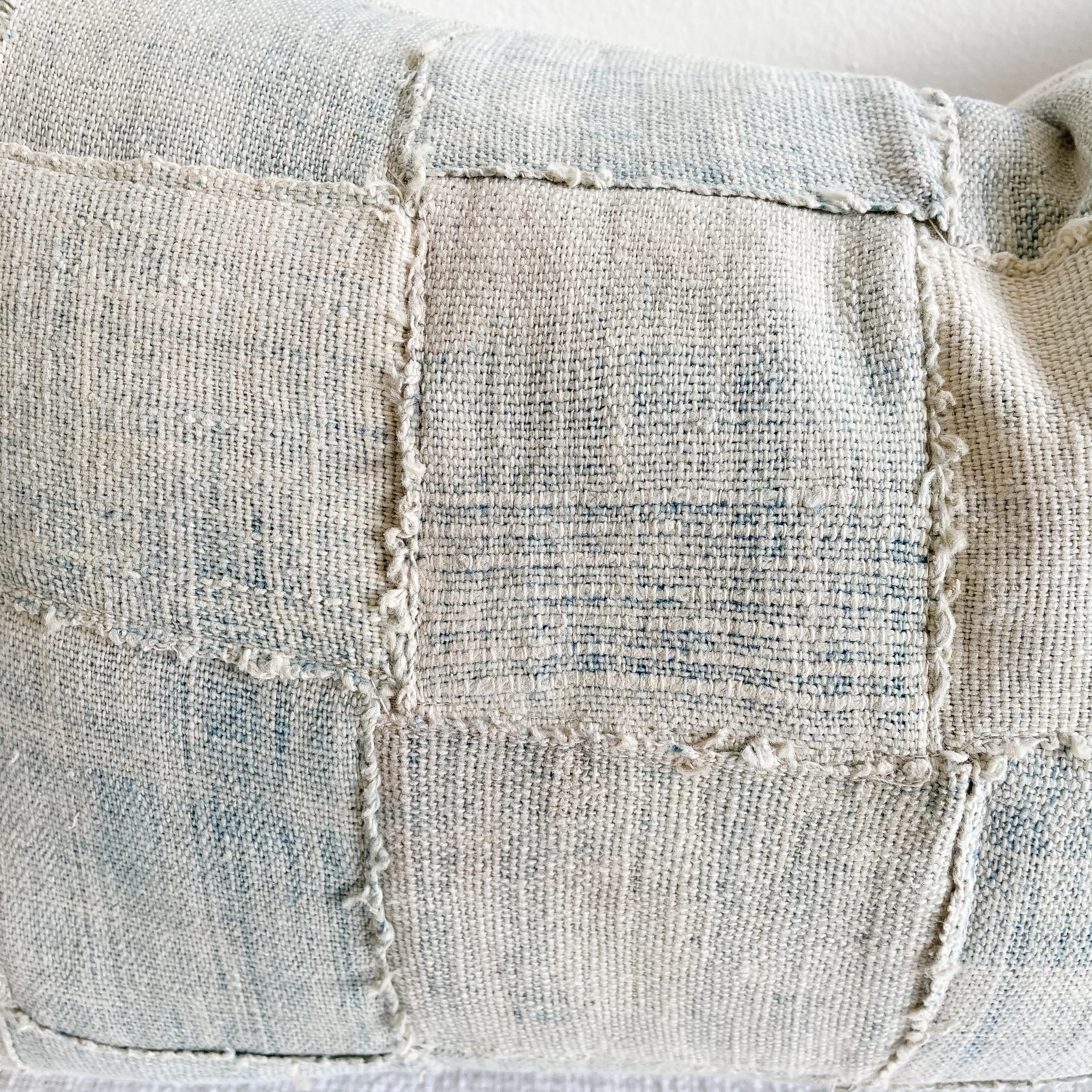 This vintage textile pillow face features a vintage batik front, we've designed this to have a basket woven face by interlocking the strips to create an even pattern and coloring. The backing is Belgian linen in natural linen. Our pillows are