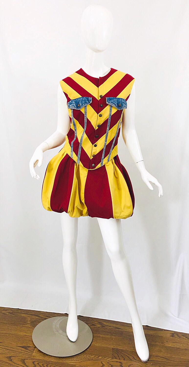 Awesome vintage custom made Harlequin Style one piece romper jumpsuit! Features thick cotton in maroon and yellow stripes. Denim pockets at each breast with denim panels. Mock brass metal buttons up the front. Hidden full zipper up the front. The