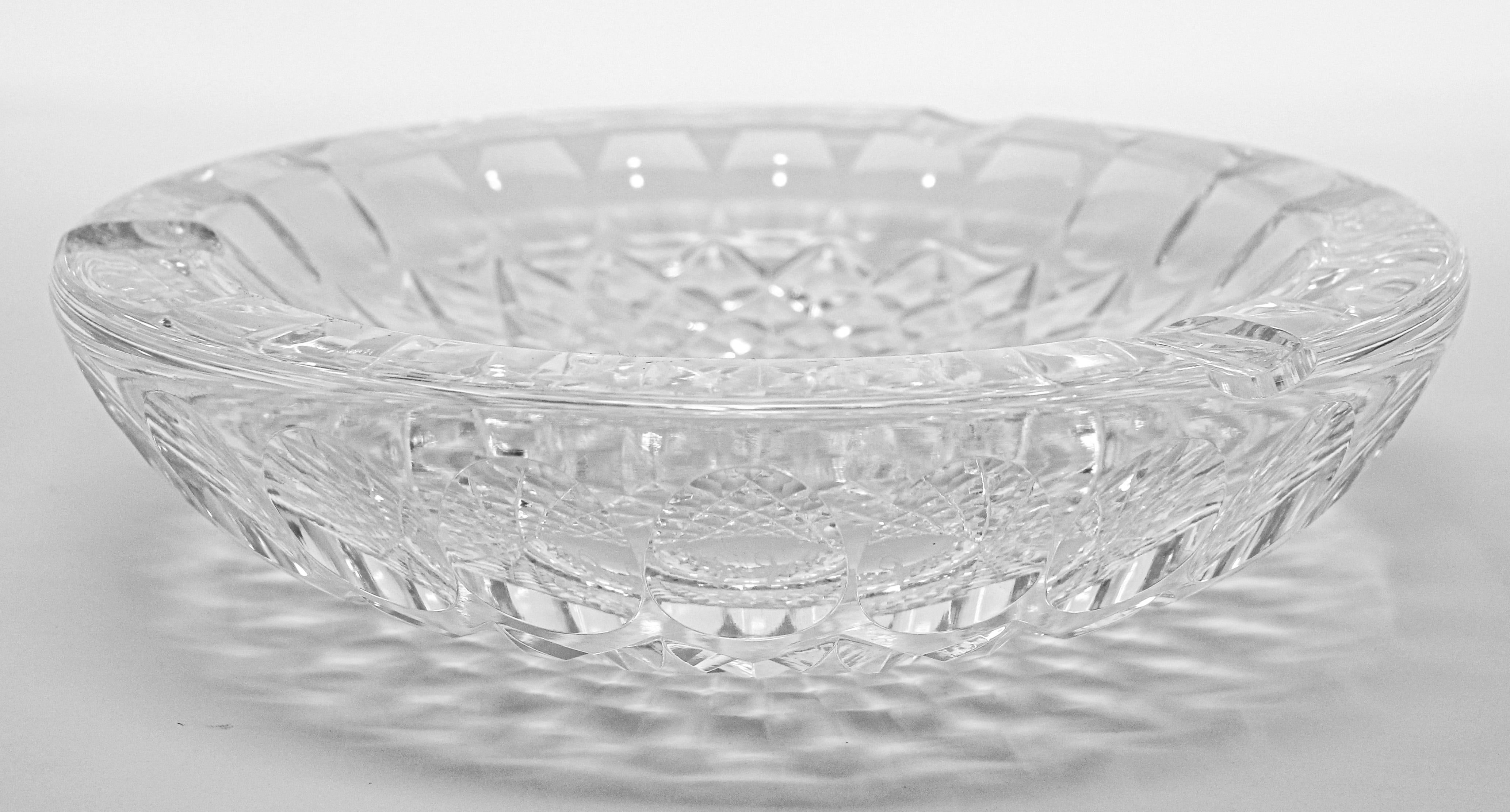 Beautiful cut crystal clear glass ashtray decorated with a monogram design.
Heavy crystal shines like a diamond.
Wonderful fashionable glass multifaceted ashtray or decorative object with 