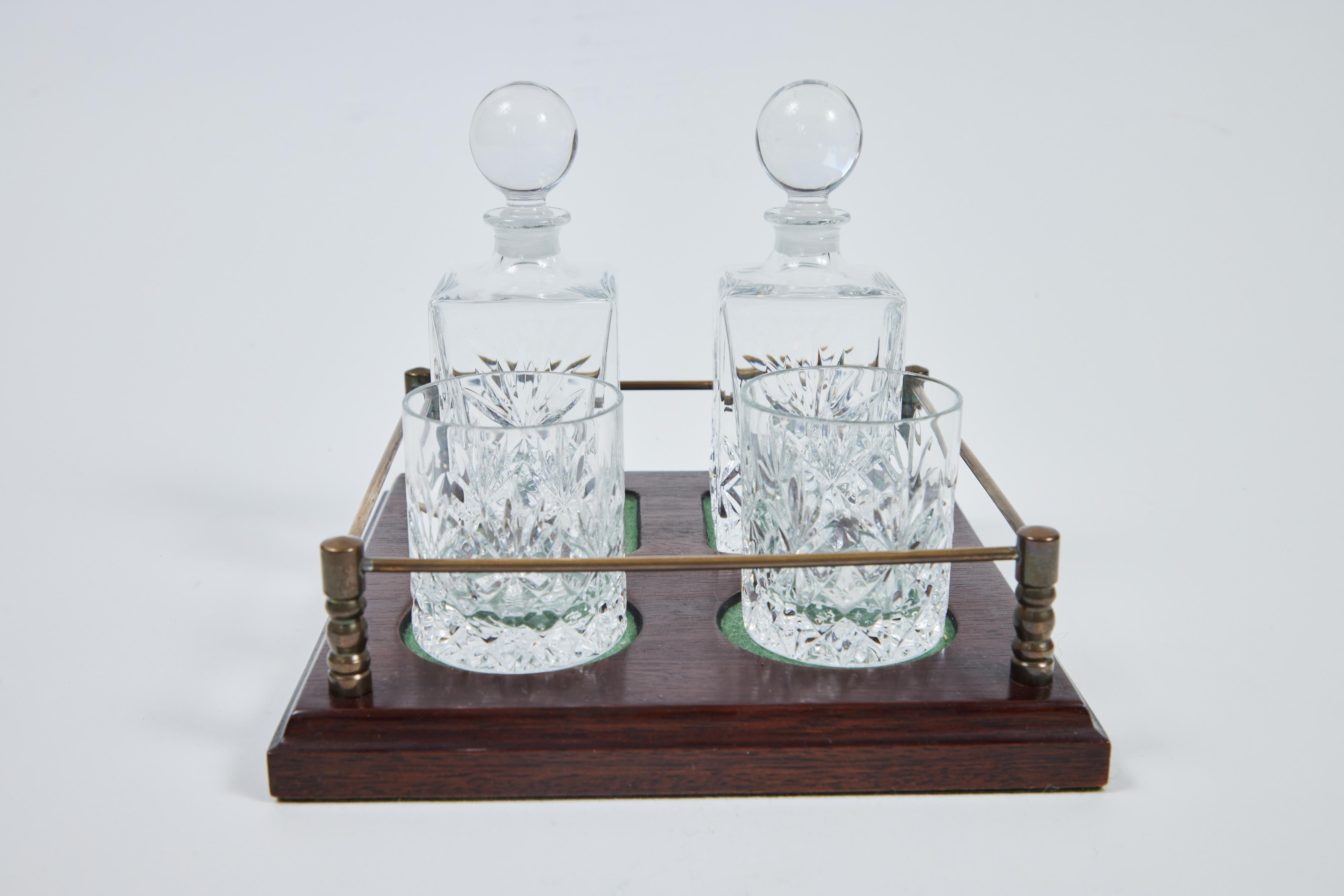 Vintage cut crystal nightcap set on a wood stand with brass gallery rail, includes 2 decanters + glasses and tray.

7 1/8