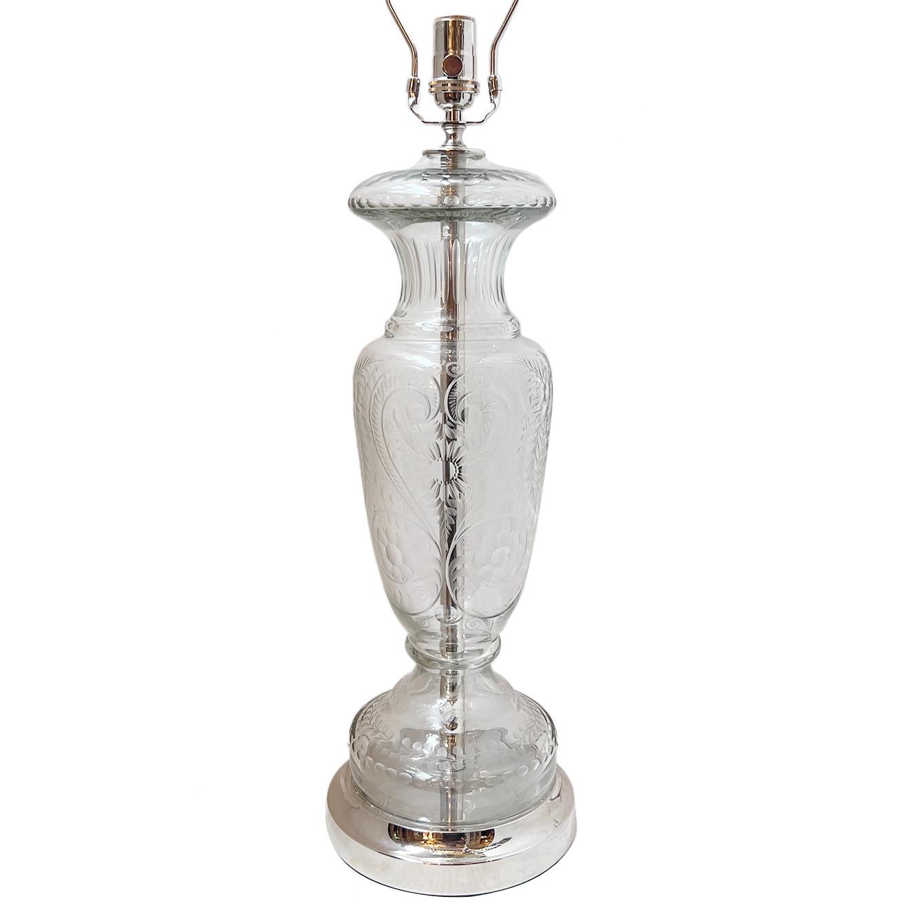 An Italian circa 1940's etched glass lamp with foliage motif.
Measurements:
Height of body: 21