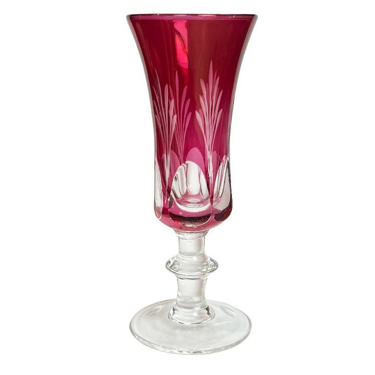 An incredible set of six cut-to-clear cranberry cordial glasses made in Italy. This set is one of our favorite finds of the year. The glasses come in their original box which is wrapped in a stunning Mid mid-century modern multicolor paper. (It's