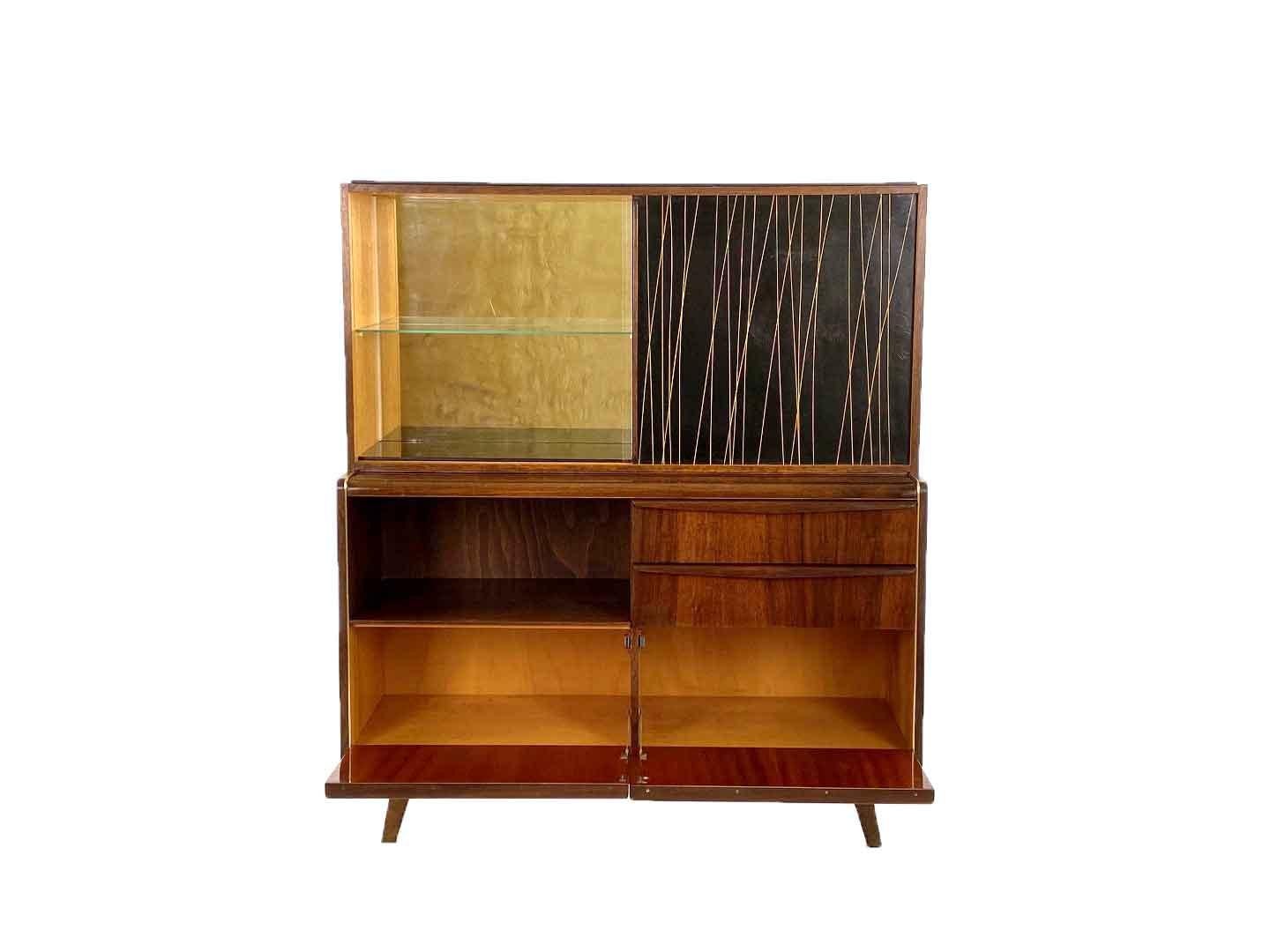 vintage czech design cocktail bar cupboard with showcase designed by bohumil landsman for jitona. produced in the 1960's in the former czechoslovakia. the cocktail bar cupboard is equipped with two drawers on the right side and two flap doors at the