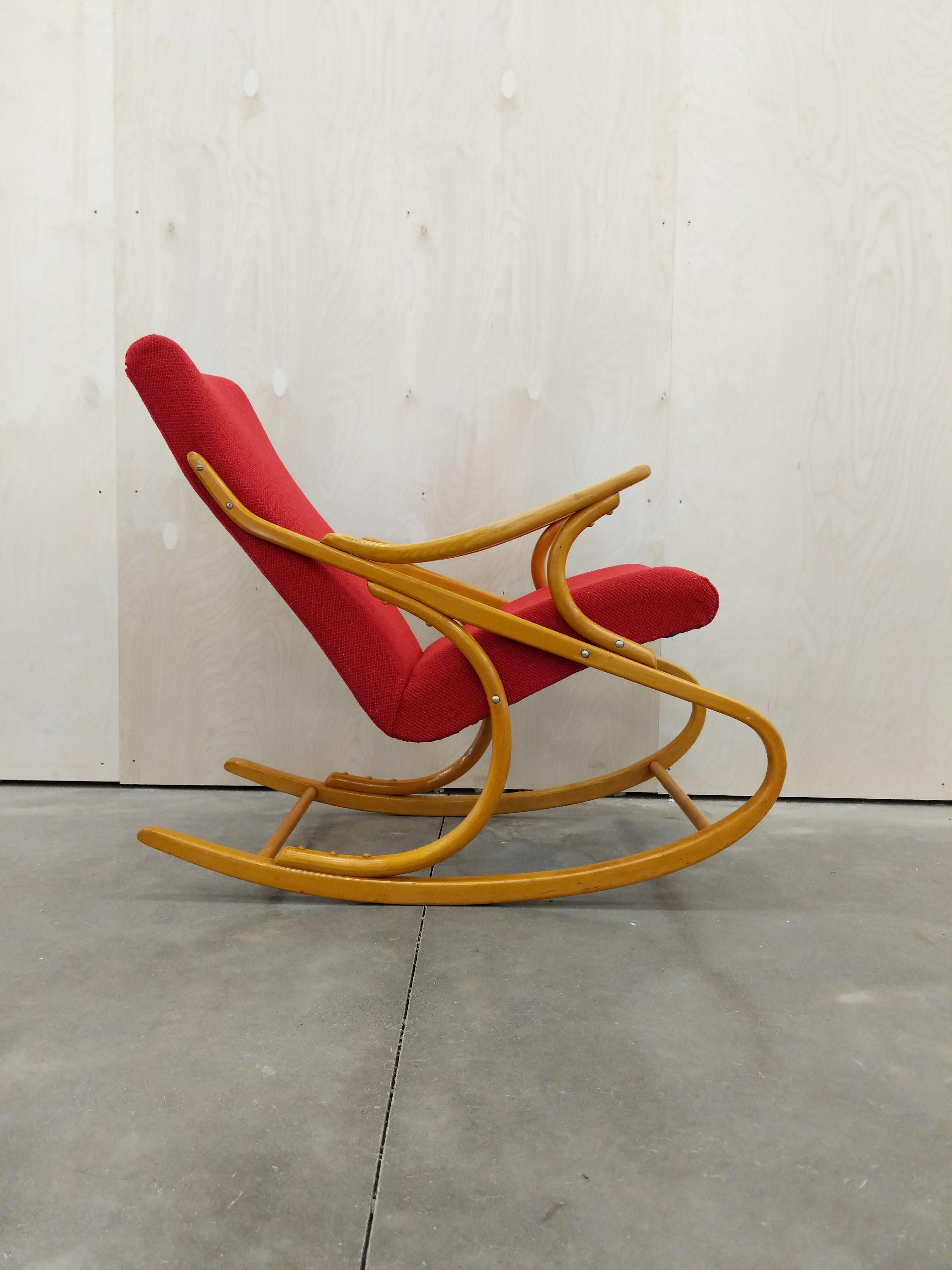 Authentic vintage Czech mid century modern rocking chair.

Designed by Antonin Suman for TON.

This chair is in excellent vintage condition with brand new Knoll upholstery.

If you would like any additional details, please contact