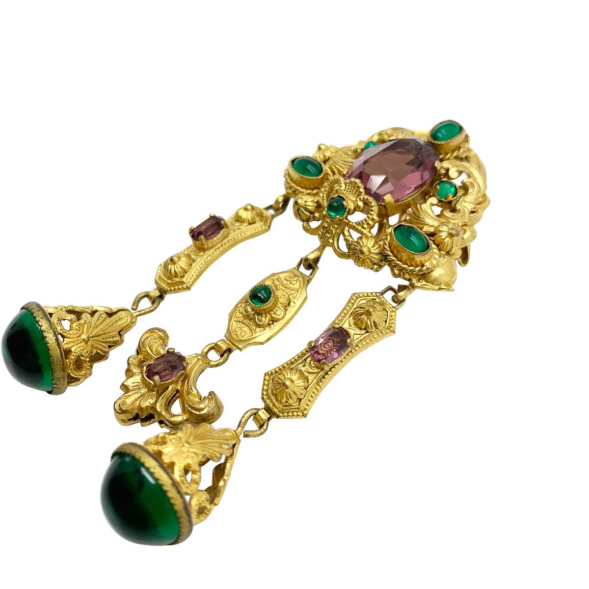 A supreme vintage Czechoslovakian filigree brooch made during the 1910s-20s era. Mesmerizingly beautiful, the brooch, having survived for around a century, boasts incredible craftsmanship and an exquisitely chosen array of crystal stones and colours