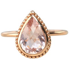 Bague vintage en morganite en forme de poire dentelée