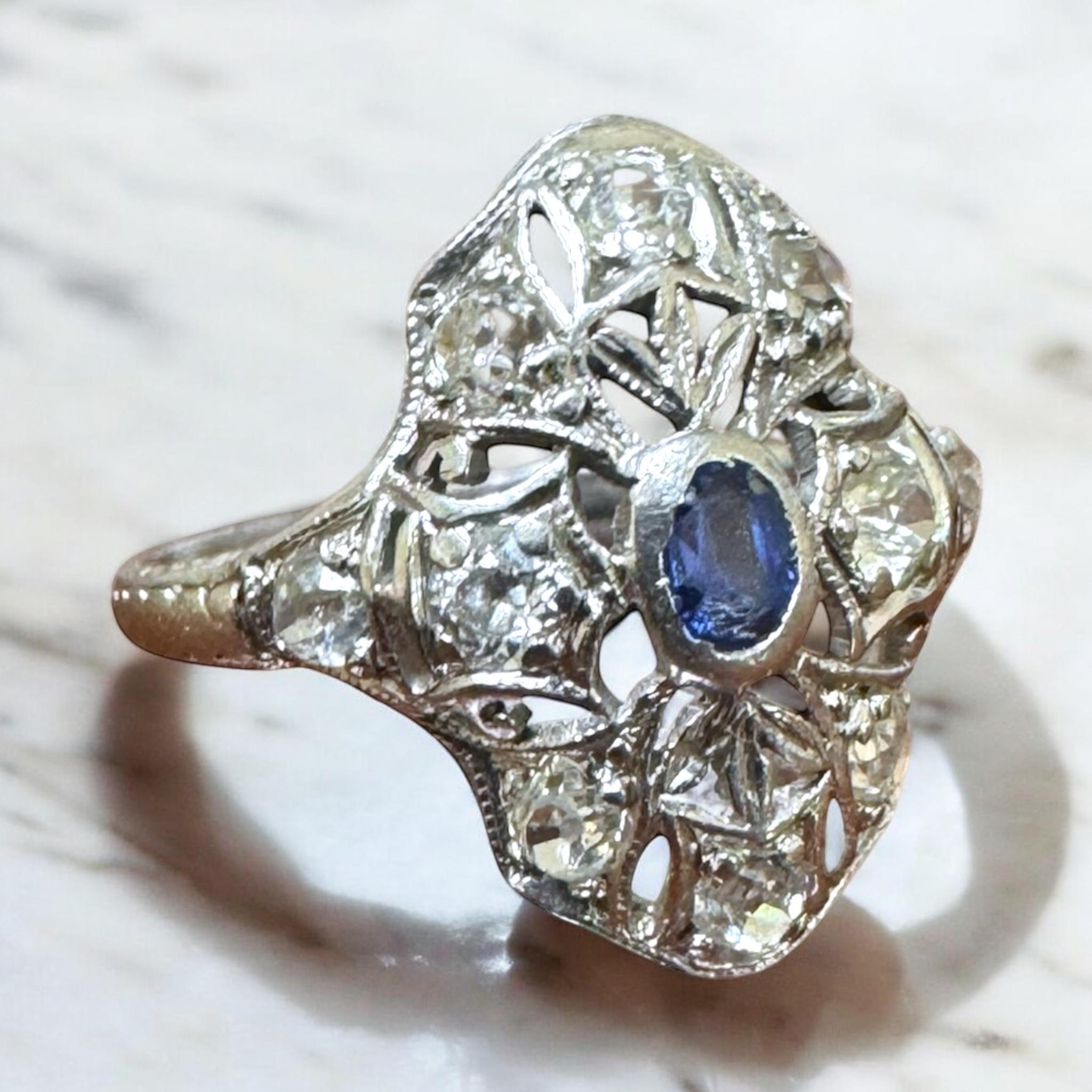 We are loving this dainty vintage beauty!

Ring Details
Material: Platinum
Era: Art Deco 1920 - 1940
Head Length: 16.7mm
Head Height: 4mm
Shank Width: 1.8mm
Weight: 2.9 Grams
Finger Size: 6
Sizable Upon Request

Accented by the following gemstones
1