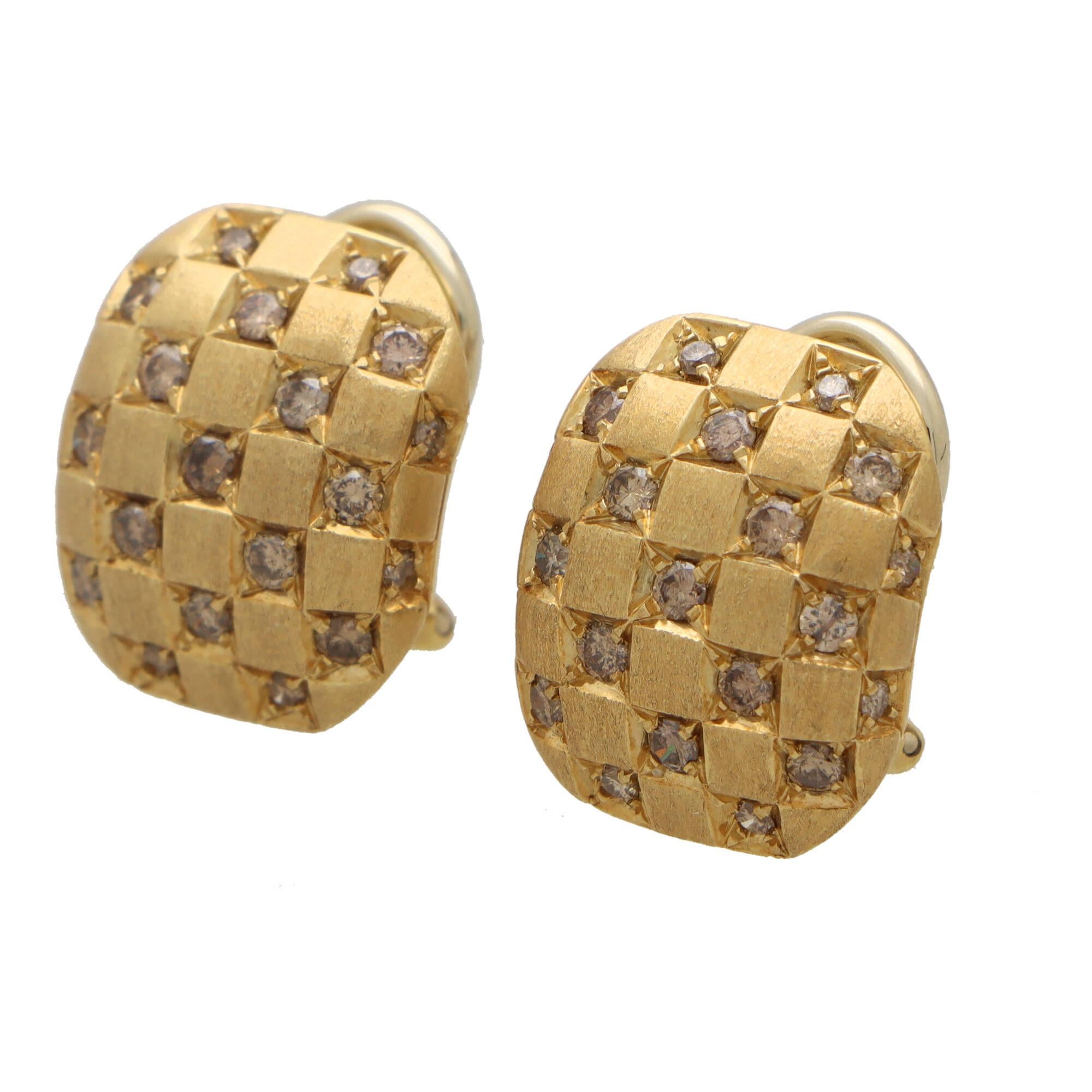 A stylish pair of vintage Damiani diamond chequerboard earrings set in 18k yellow gold.

Each earring is composed of a chequerboard design, alternating between brushed yellow gold squares and squares set with round cut cognac brown diamonds. The