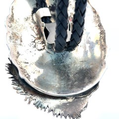 Vintage Dan Nieto Sterling Silver Turquoise Detailed Wolf Black Leather Bolo Tie