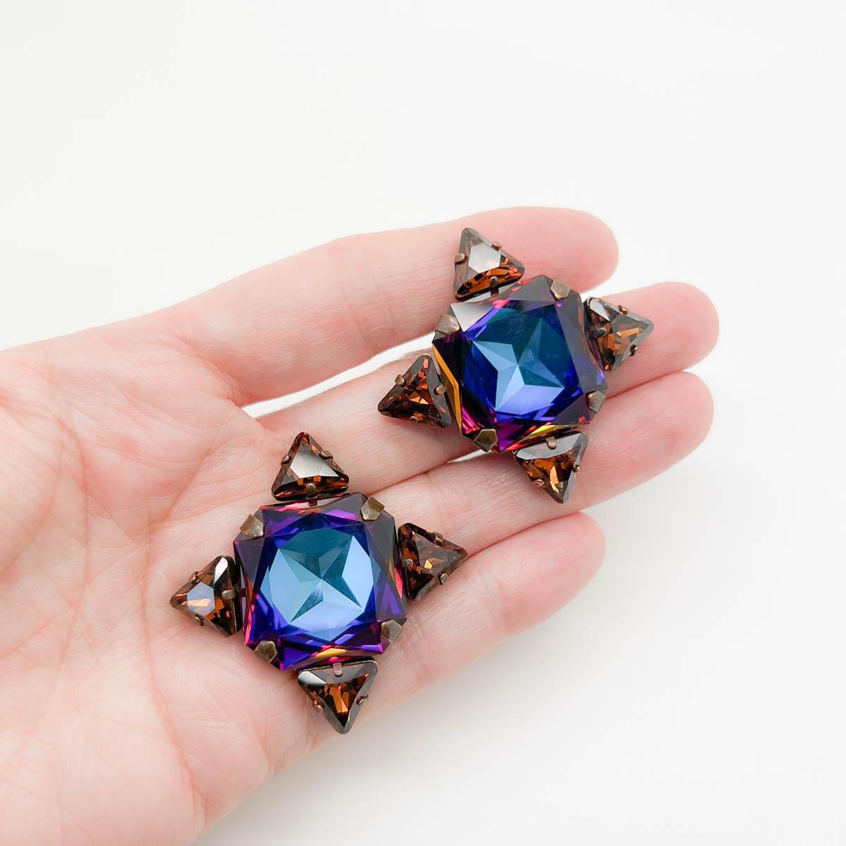 A Pair of Vintage Daniel Swarovski Kaleidoscope Earrings. Hailing from one of Swarovski's most exclusive collections named after the companies founder these earrings feature stone cuts and colours that are unique to Daniel Swarovski collections. The
