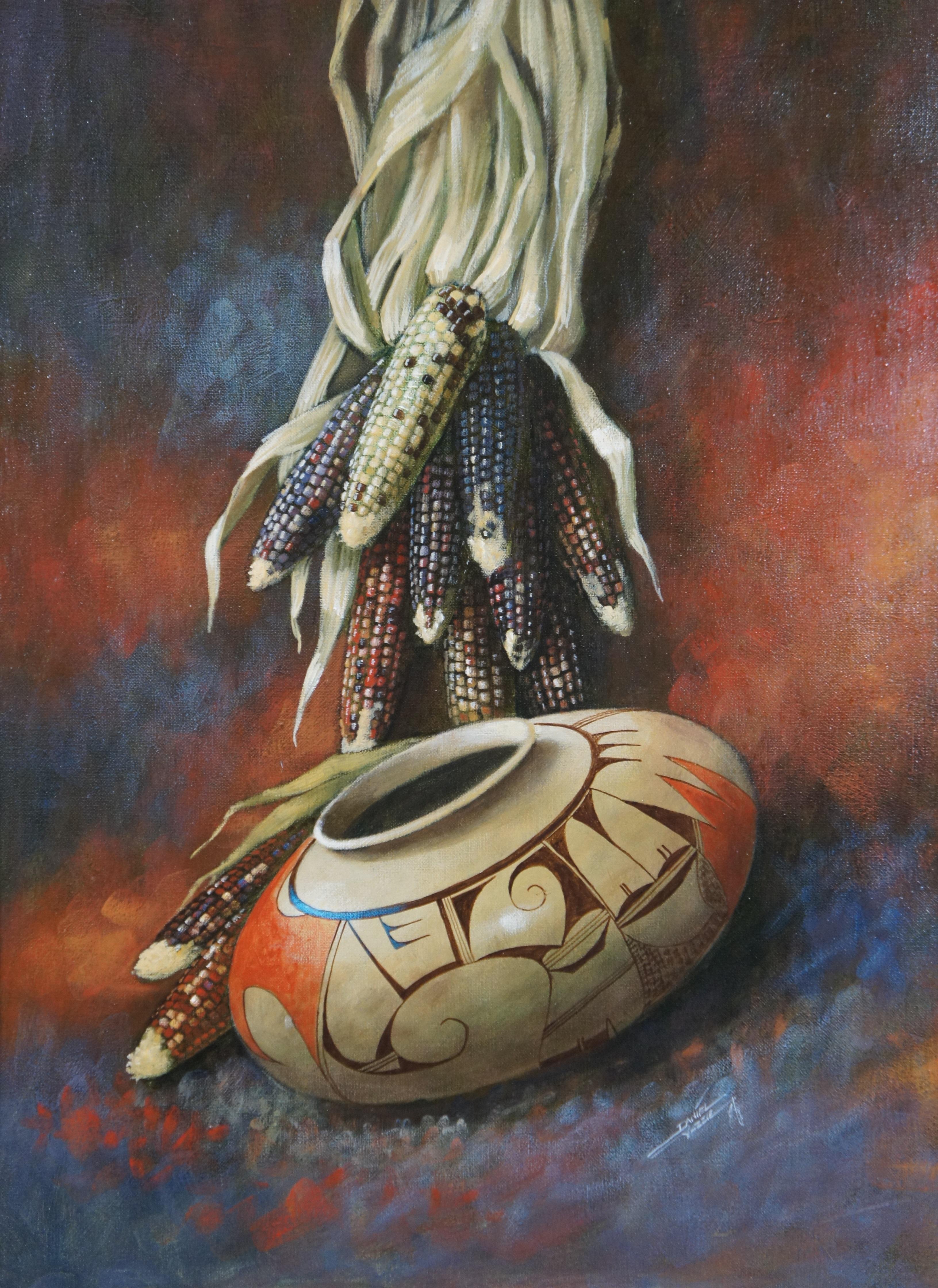 Vibrant oil on canvas still life painting by Daniel Yazzie, showing Southwestern / Native American pottery and corn. Signed in lower right. Framed in light wood frame with raised bevel.

Daniel Yazzie (Navajo, 1954-2022)
