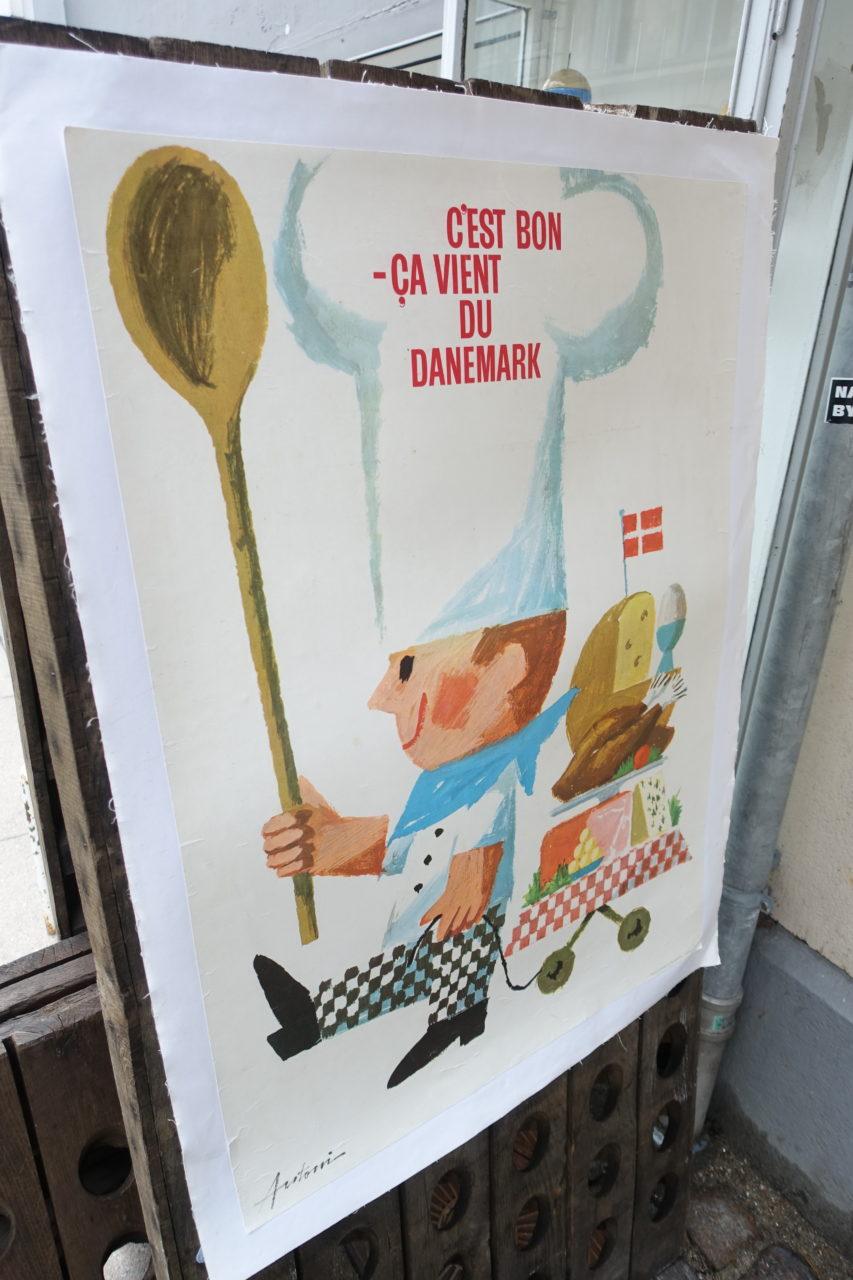 Vintage Danish advertising poster, found in a flea market in the South of France. Designed by the renowned Danish sketcher, poster artist and graphic designer Ib Antoni Jensen (1929-73), who is also known for his posters for Tivoli in Copenhagen.