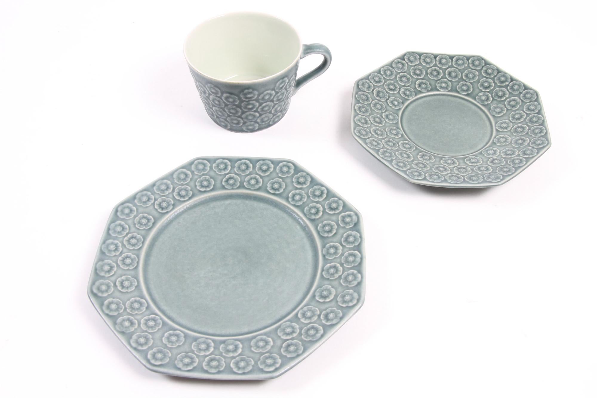 Vintage Danish Azur coffee/tea service trio by Jens H. Quistgaard for Kronjyden.
This beautiful Mid-Century Modern stoneware set by IHQ consists of a cup, a saucer and a side plate. Very lovely delicate flower pattern in the color azur, hence the