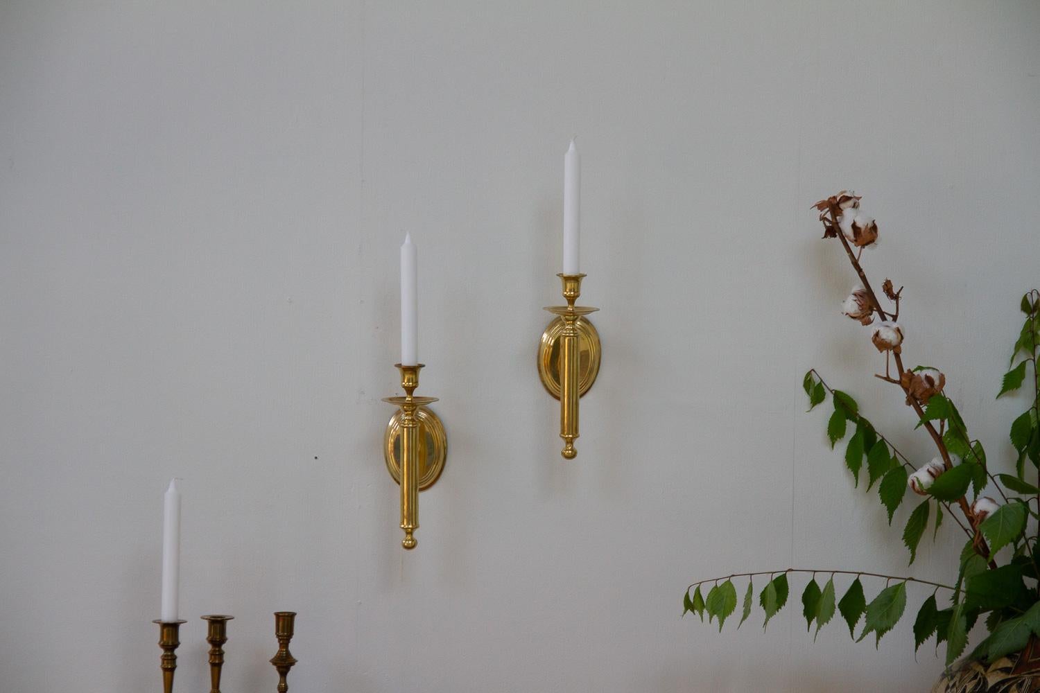 Vintage Danish Brass Candle Sconces, 1950s. Set of 2.
Pair of elegant Danish wall mounted brass candleholders from the mid 20th century. 
Very good original condition.