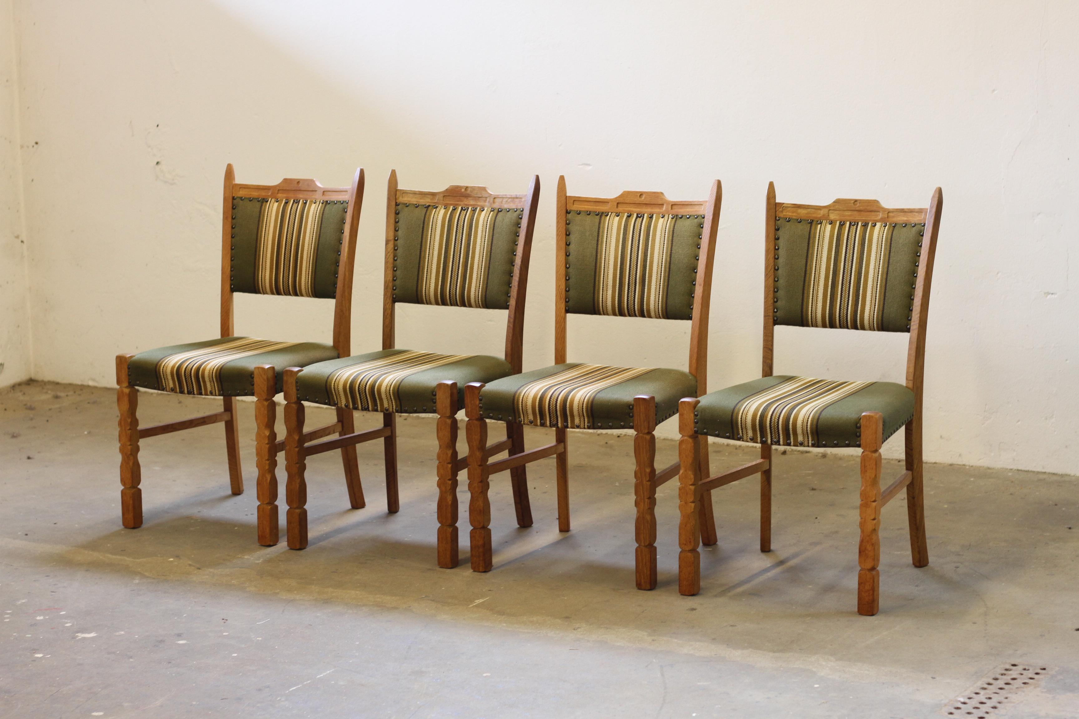 Crafted in Denmark in the 1960s/70s, inspired by Henning Kjærnulf’s Brutalist / Baroque Bold style. Each chair is solid with no damage to the wood, and the fabric is well-preserved and in good shape though we recomend a reupholstery in the near by