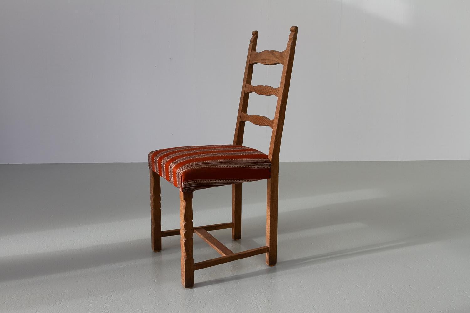 Vintage Danish Brutalist Ladder Back Oak Dining Chair, 1960s. 

Scandinavian Mid-Century modern dining room chairs in Nordic oak. Very likely designed by Henning Kjærnulf, Denmark as he often incorporated a mix of baroque and brutalist details in