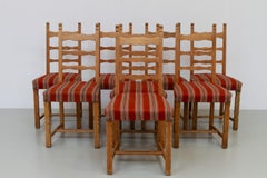 Vintage Danish Brutalist Ladder Back Oak Dining Chairs, 1960er Jahre. Satz von 8.
