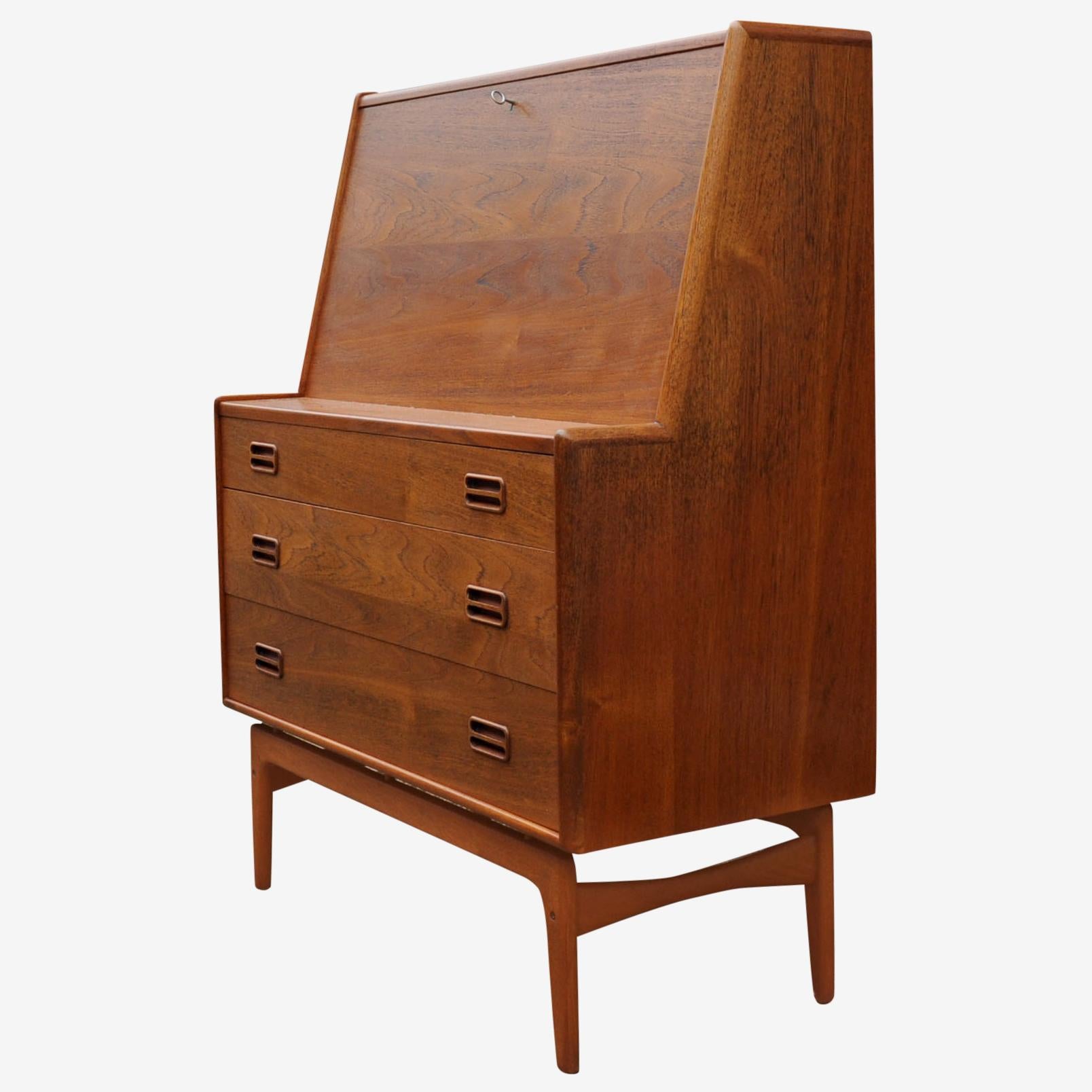 A teak bureau by Arne Hovmand Olsen for Mogens Kold.

Designer - Arne Hovmand Olsen

Manufacturer - Mogens Kold

Design Period - 1960 to 1969

Country of Manufacture - Danish

Style - Vintage

Detailed Condition - Good with minimal