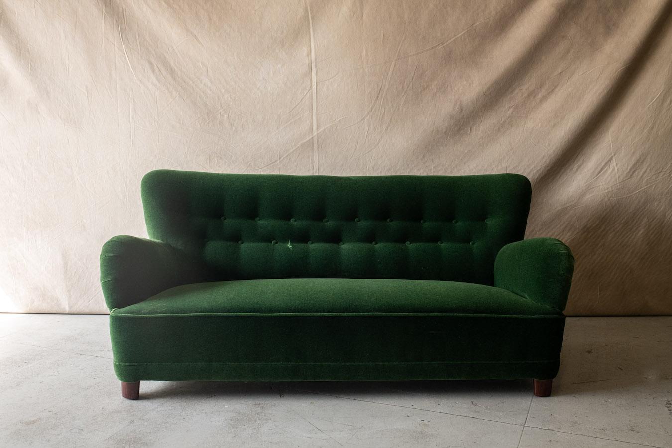 Vintage Danish Cabinetmaker Sofa In Mohair/Velour Fabric, Circa 1950.  Fantastic quality and design.  Upholstered a green mohair velvet fabric.  

We don't have the time to write an extensive description on each of our pieces. We prefer to speak