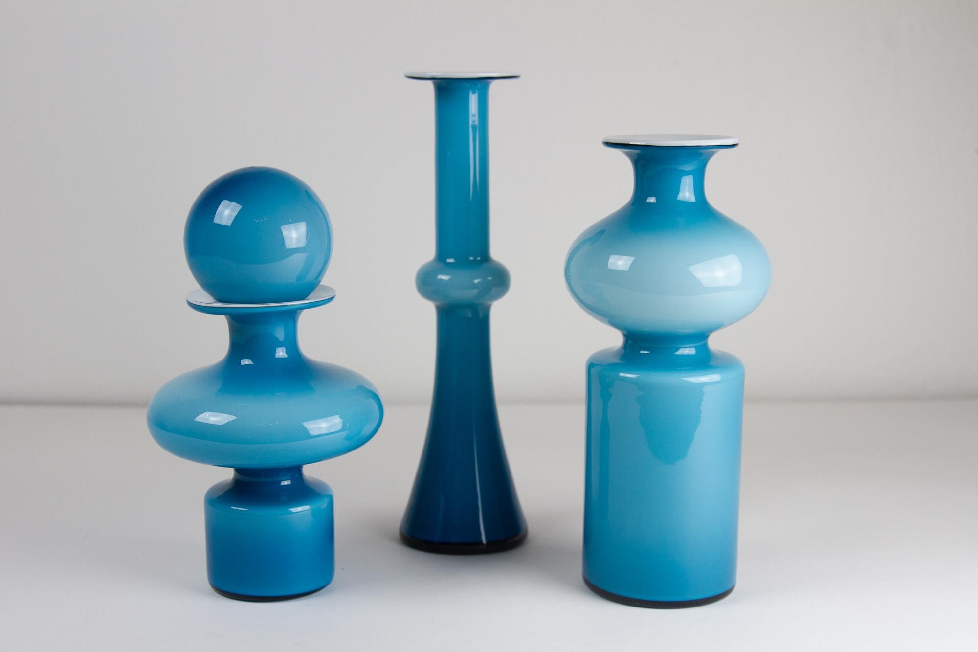 Vintage Danish Carnaby Vases by Per Lütken for Holmegaard 1960s. Set of 3.
Danish modern set of hand blown glass vases designed by Per Lütken for Kastrup-Holmegaard, Denmark. Only manufactured from 1968 to 1976.
Opaline with blue overlay.

This