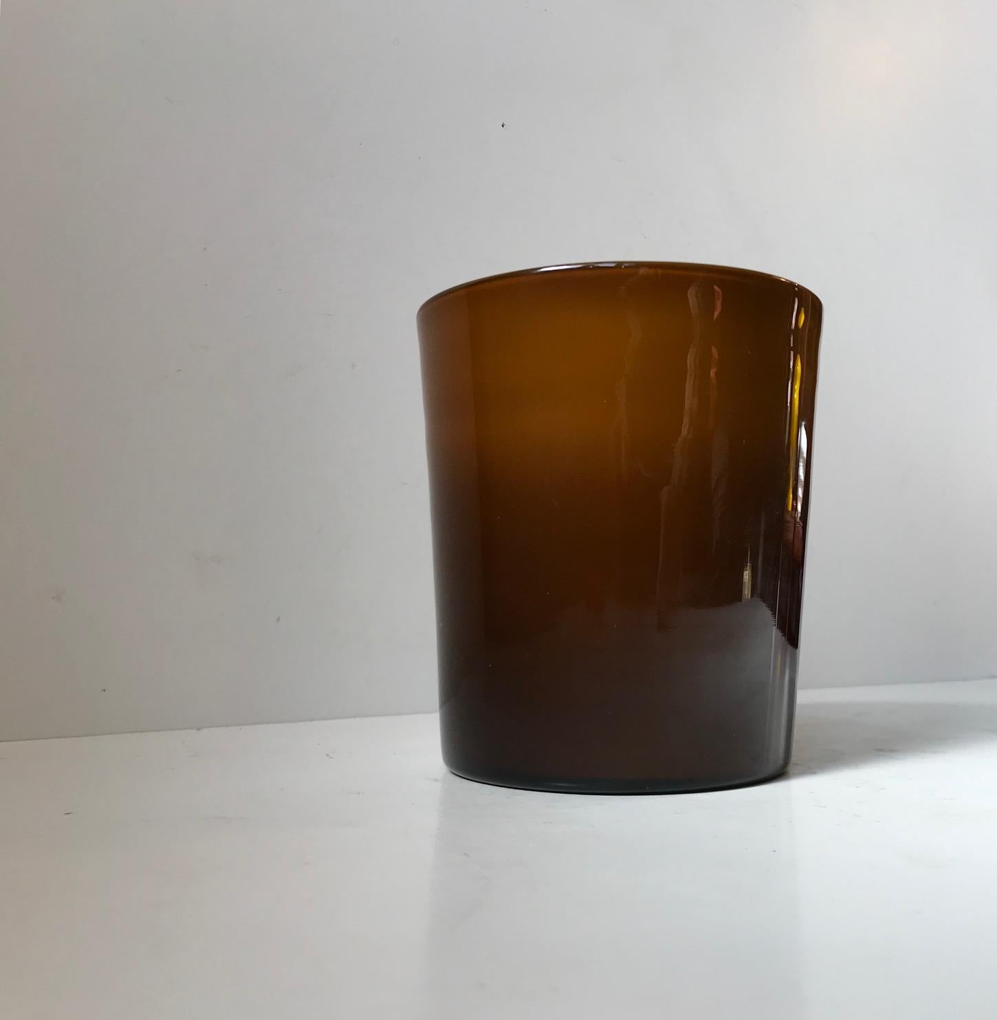 A rare colored hand blown flower pot or vase designed by Michael Bang as a part of the series Palet. The exterior glass is caramel in color: brown and orange depending on how the light hits it. The interior glass is opaline or milk glass. It was