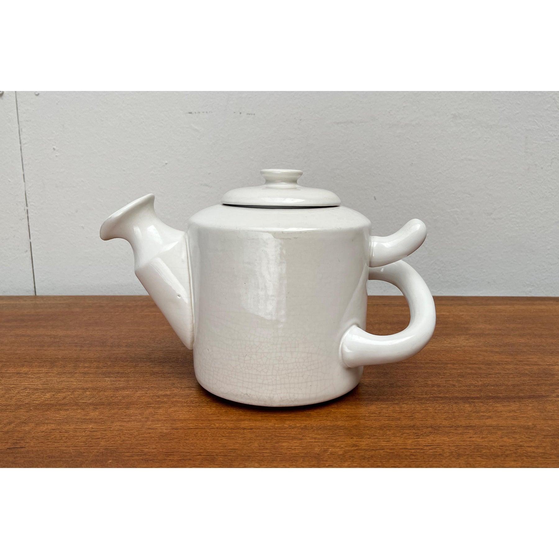 Vintage Danish Ceramic Teapot from Pollas Design, 1970s, in Very Good conditions. Designed 1970 to 1979 This piece has an attribution markIt is completely authentic 

Additional information:
Materials: Ceramic
Color: Ivory
Country of Origin: