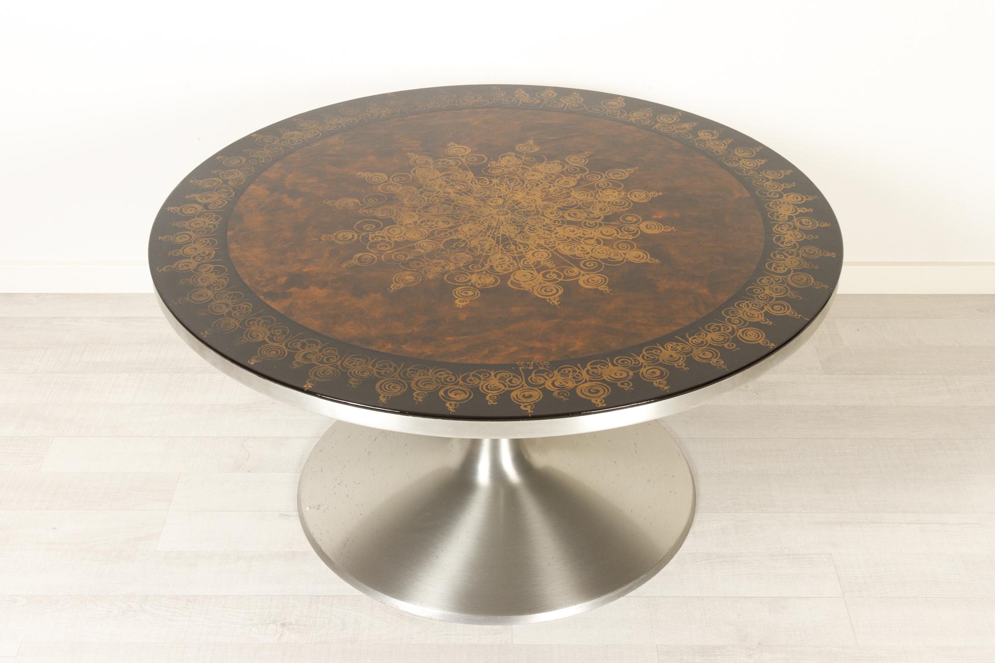 Vintage Danish coffee table by Poul Cadovius for Cado 1970s
Beautiful and spectacular round coffee table with aluminum tulip base designed by Poul Cadovius with graphics by Susanne Fjeldsøe aka 