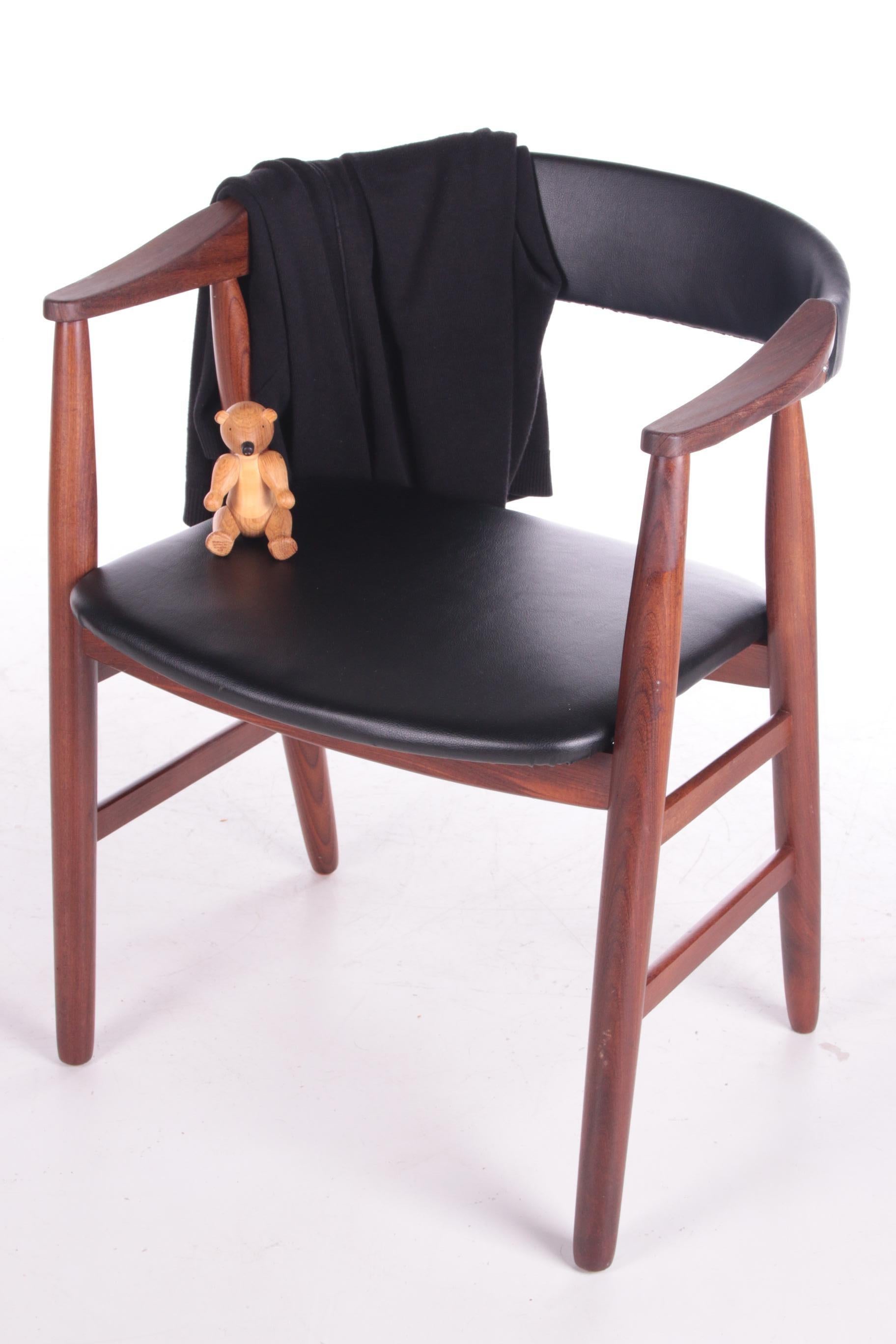 Vintage Danish design office chair from Farstrup, Denmark 1960.

Danish vintage design office chair from the Farstrup furniture factory. The chair comes from the sixties and is upholstered with black artificial leather (original). The condition is