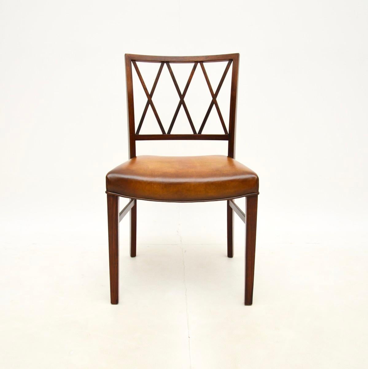 An outstanding vintage Danish leather desk chair by Ole Wanscher, dating from the 1960’s.

It is of amazing quality and has a gorgeous design, with a beautiful pierced lattice back. It stands on finely tapered legs and has gorgeous leather