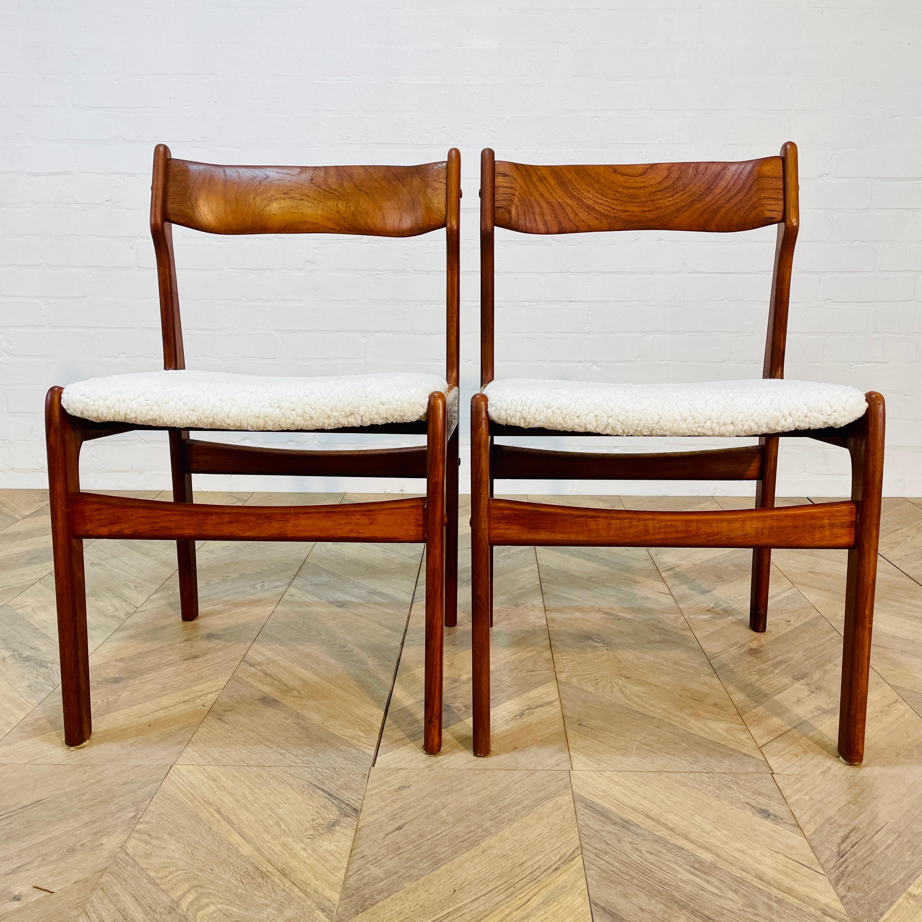 A Beautiful Set of 2, Teak Danish Dining Chairs Inspired by Erik Buch and manufactured in the 1970s.

The chair frames are all solid & completely original, in good overall condition with signs of use, in the form of scratches and abrasions,