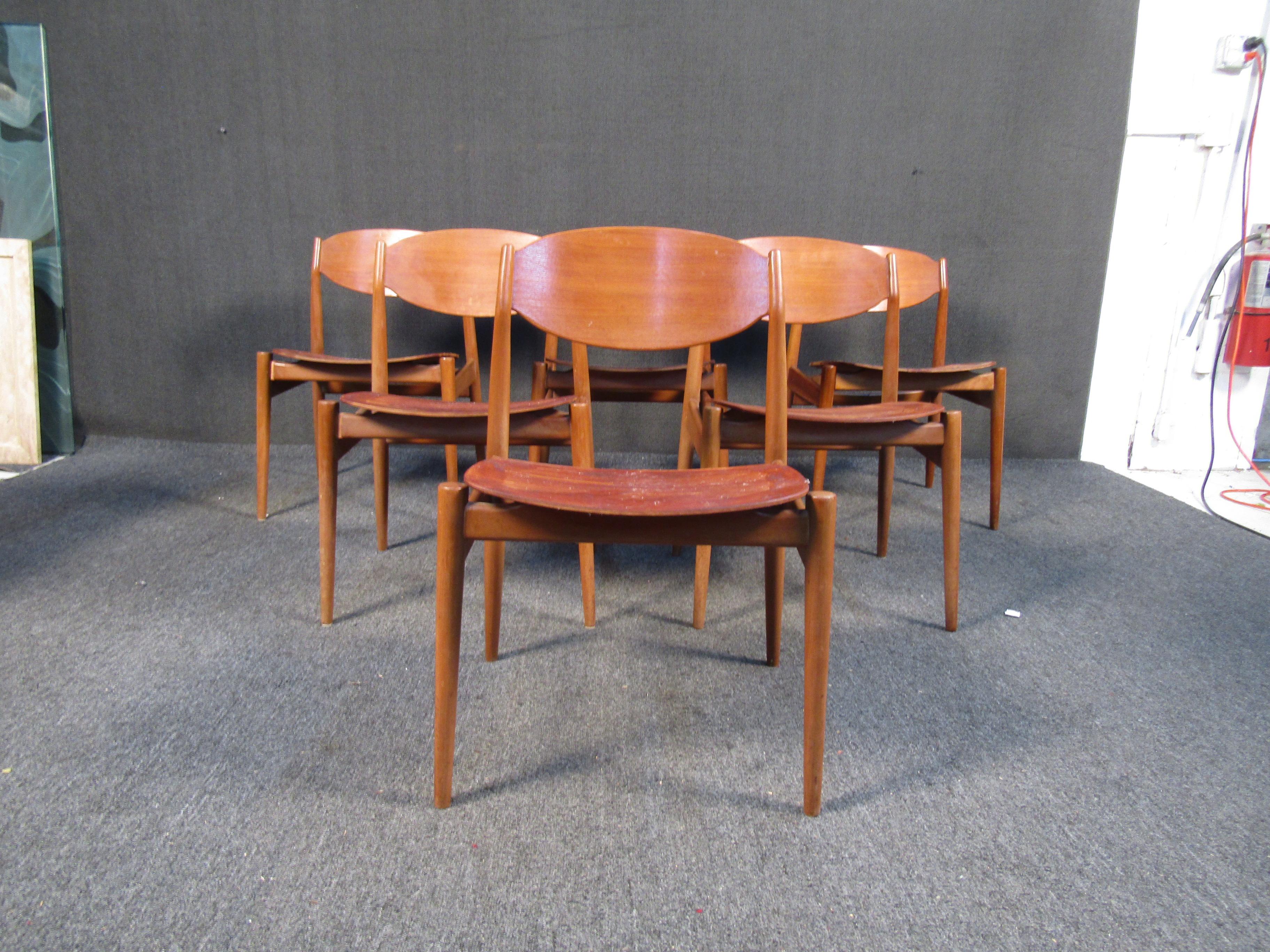 ( 6 ) Vintage Teak Danish dining chairs. These beautifully constructed dining chairs feature an all teak construction, contoured seat and back rests as well as tapered legs. These chairs have had all fabric removed, and they are ready for