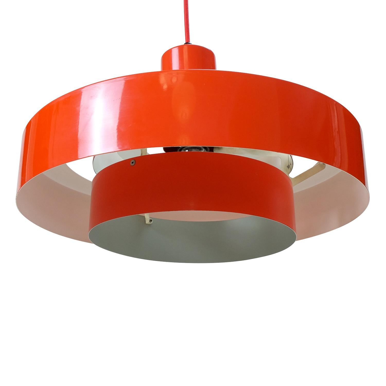 This Equator model pendant lamp was designed by Jo Hammerborg for Fog and Mørup in Denmark.

The electric wiring has been replaced with a new red cotton electric cord.