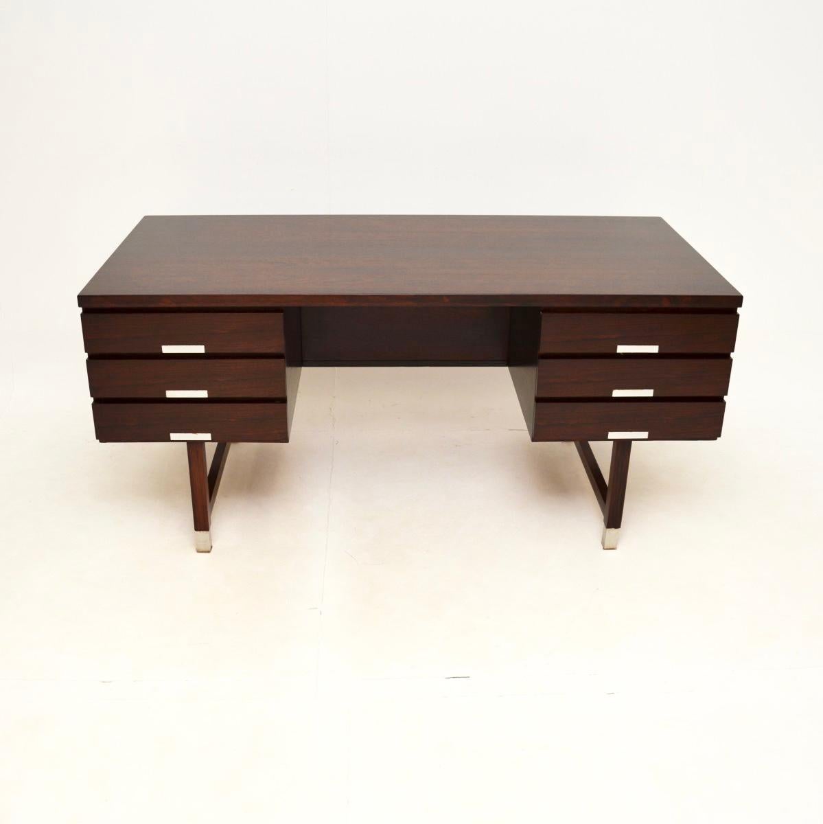A superb Danish executive desk model EP401 by Ejgil Petersen Mobelfabrik. This was recently imported from Denmark, it dates from the 1960’s.

The quality is outstanding, this is beautifully made and is a great size. There is plenty of work space and