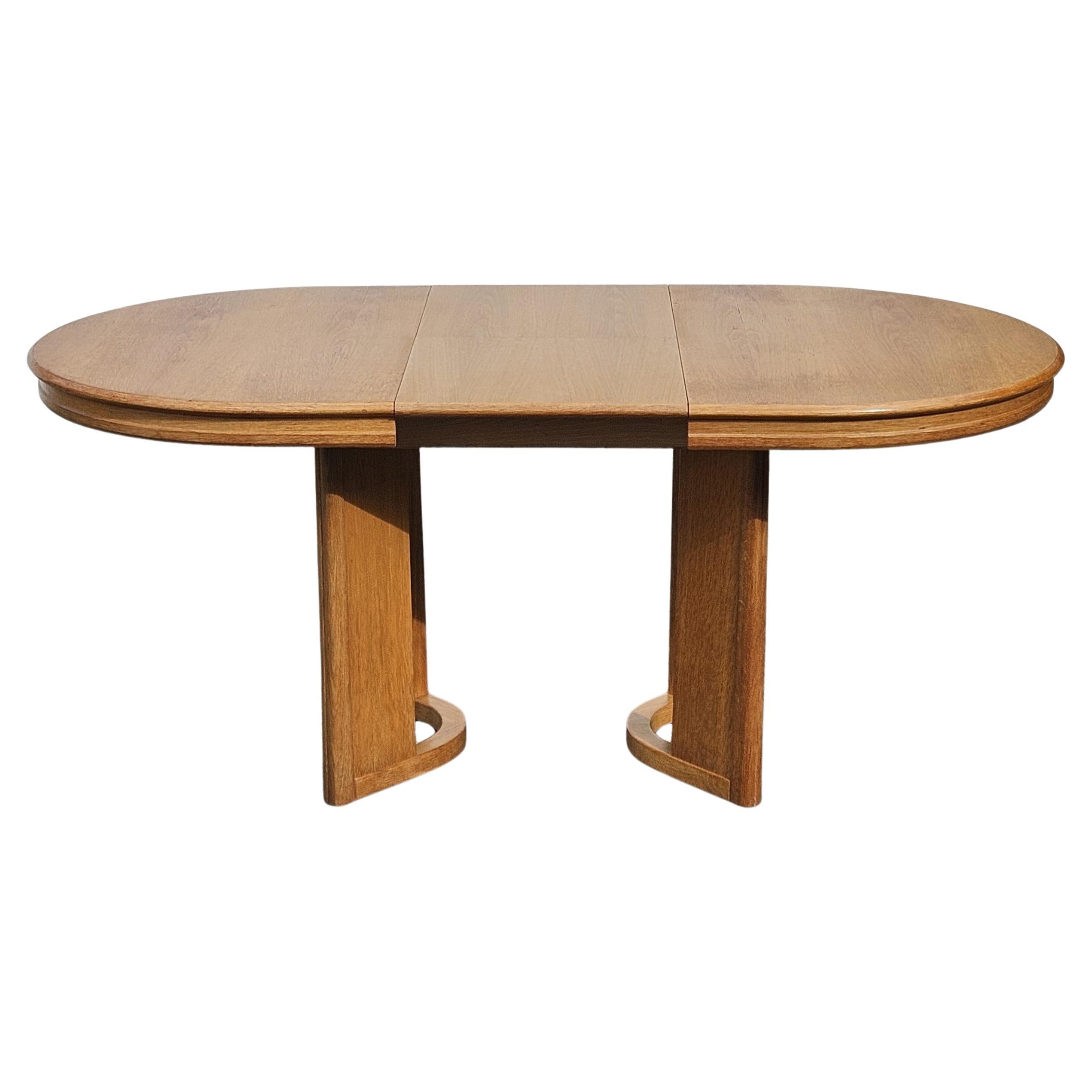 Classic Danish Postmodern Elmwood Dining Table from the 80s
Minimalist Dining Table for 4-6 people, made of high-quality solid wood with a perfect sliding Extension System.
The extensions are integrated into the Table and can be easily inserted by