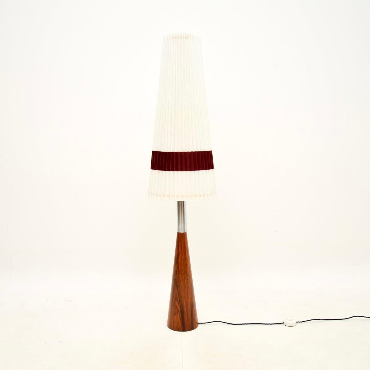 A very stylish and well made vintage Danish and chrome floor lamp, dating from the 1960’s.

This has a fantastic design and it is of amazing quality. The thick solid base is beautifully tapered with a chrome top beneath the socket. The conical shade