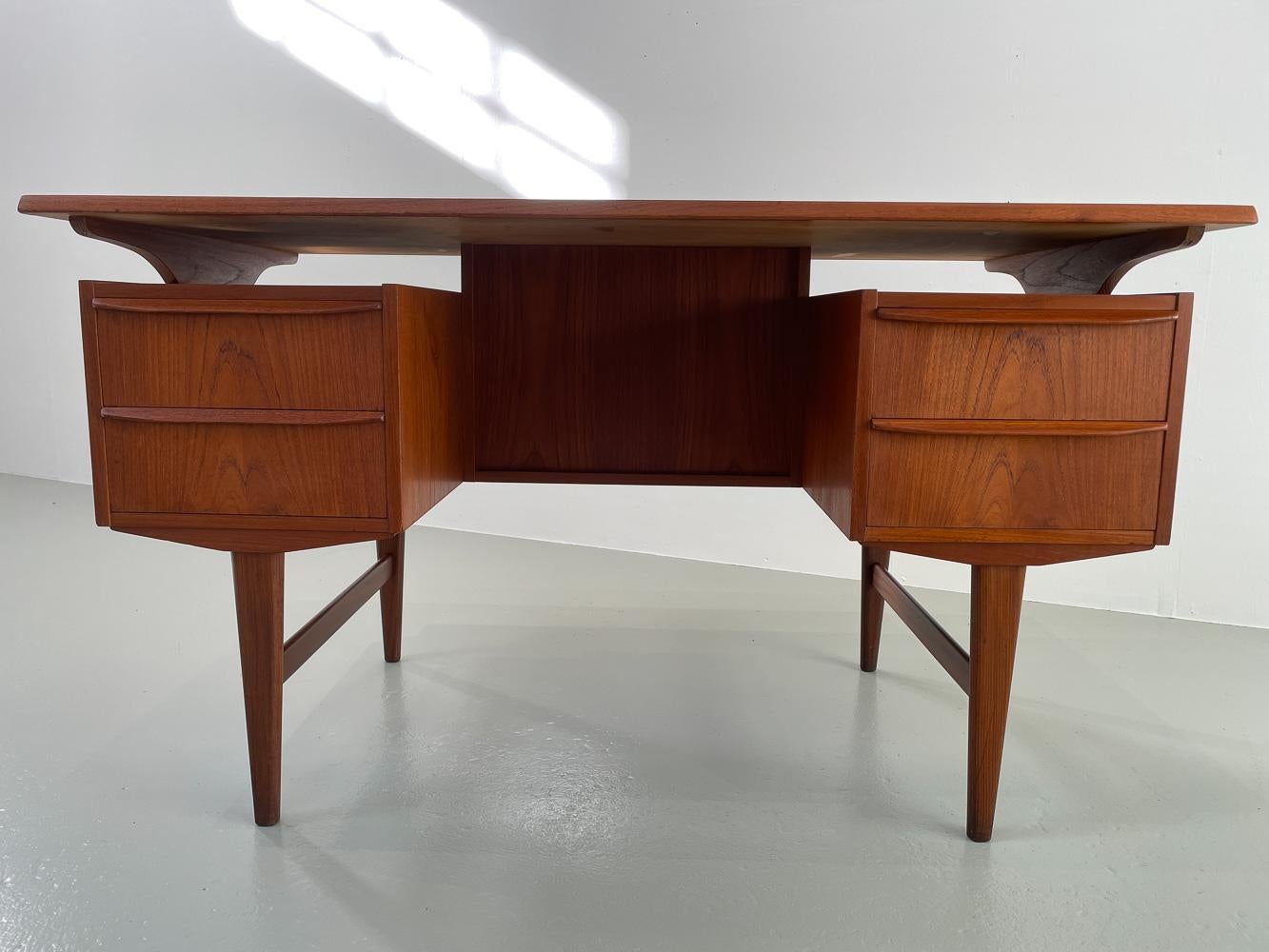 Mid-20th Century Vintage Danish Freestanding Teak Desk with Floating Top, 1960s.