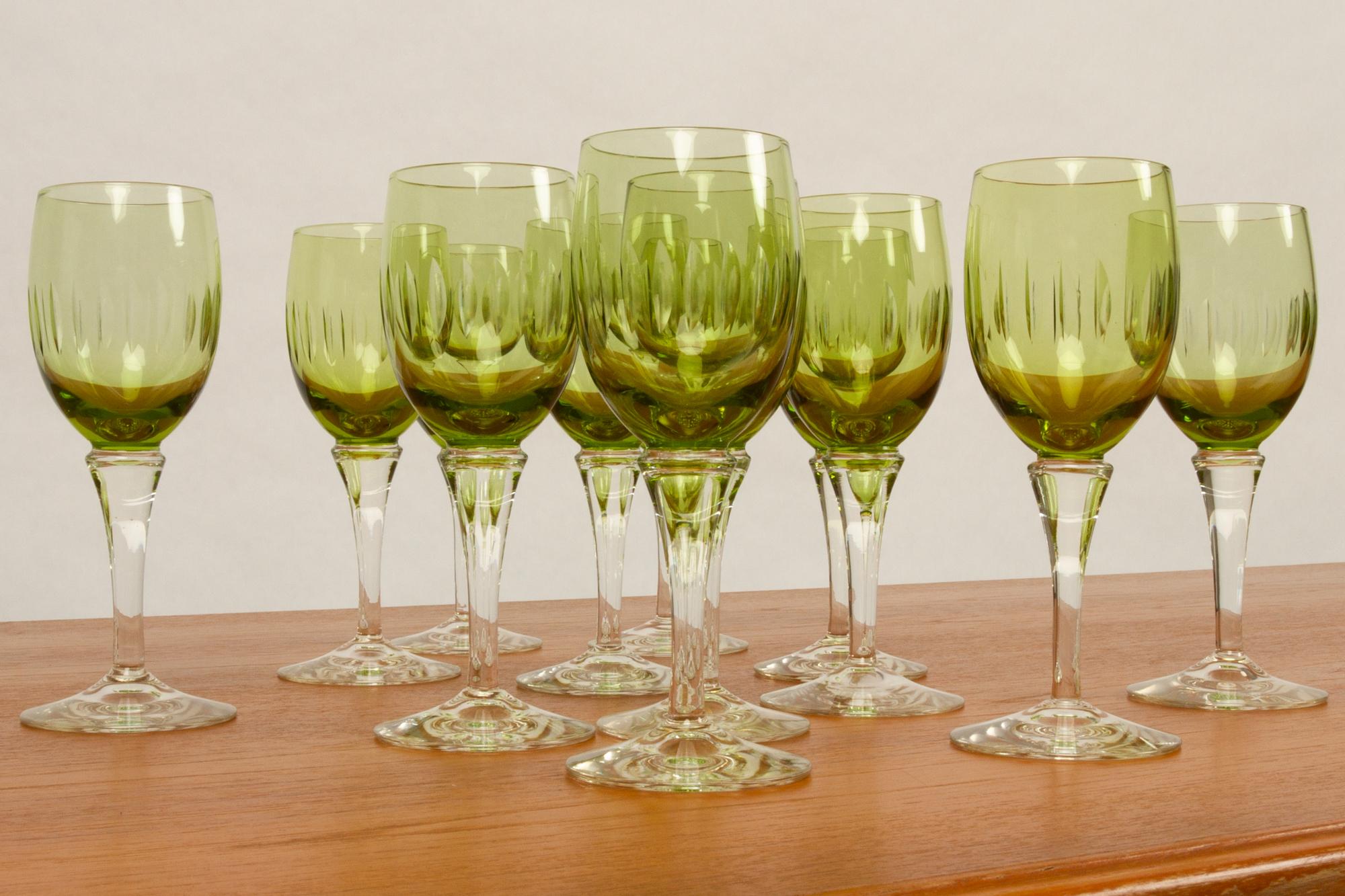 Vintage Danish green wine glasses Leonora, 1960s
12 glasses for white wine designed by Christer Holmgren for Holmegaard Glassworks in 1964. Made between 1964 and 1970. Measures: Height 15cm.
Very good condition. No chips or cracks.