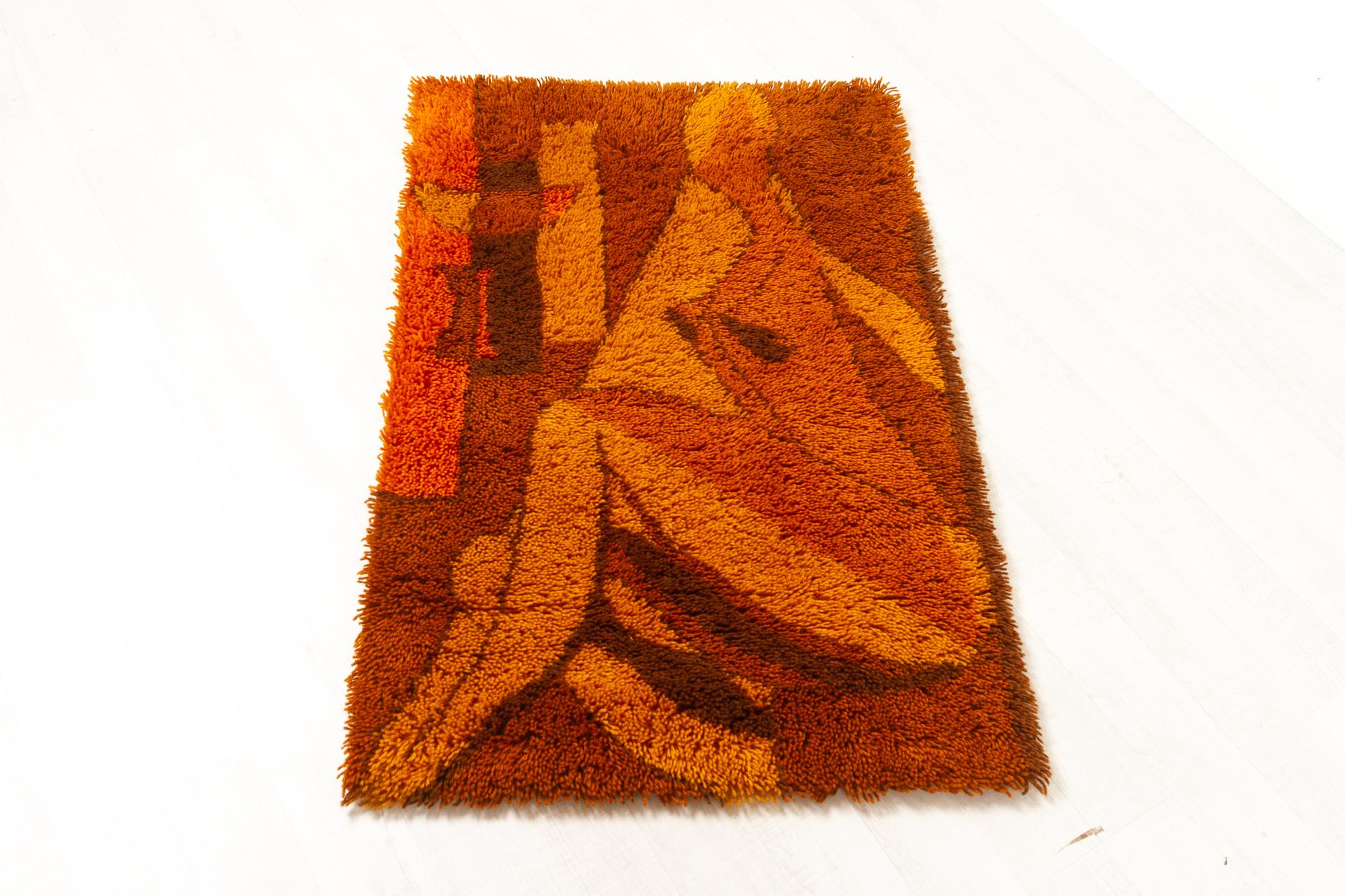 Vintage Danish high pile orange wool rya rug by Gram 1960s 
Danish Mid-Century Modern wall Rya rug 100% pure wool for use as wall art. Beautiful shades of orange and brown. 
Original makers label on the back.
Previously used only for wall