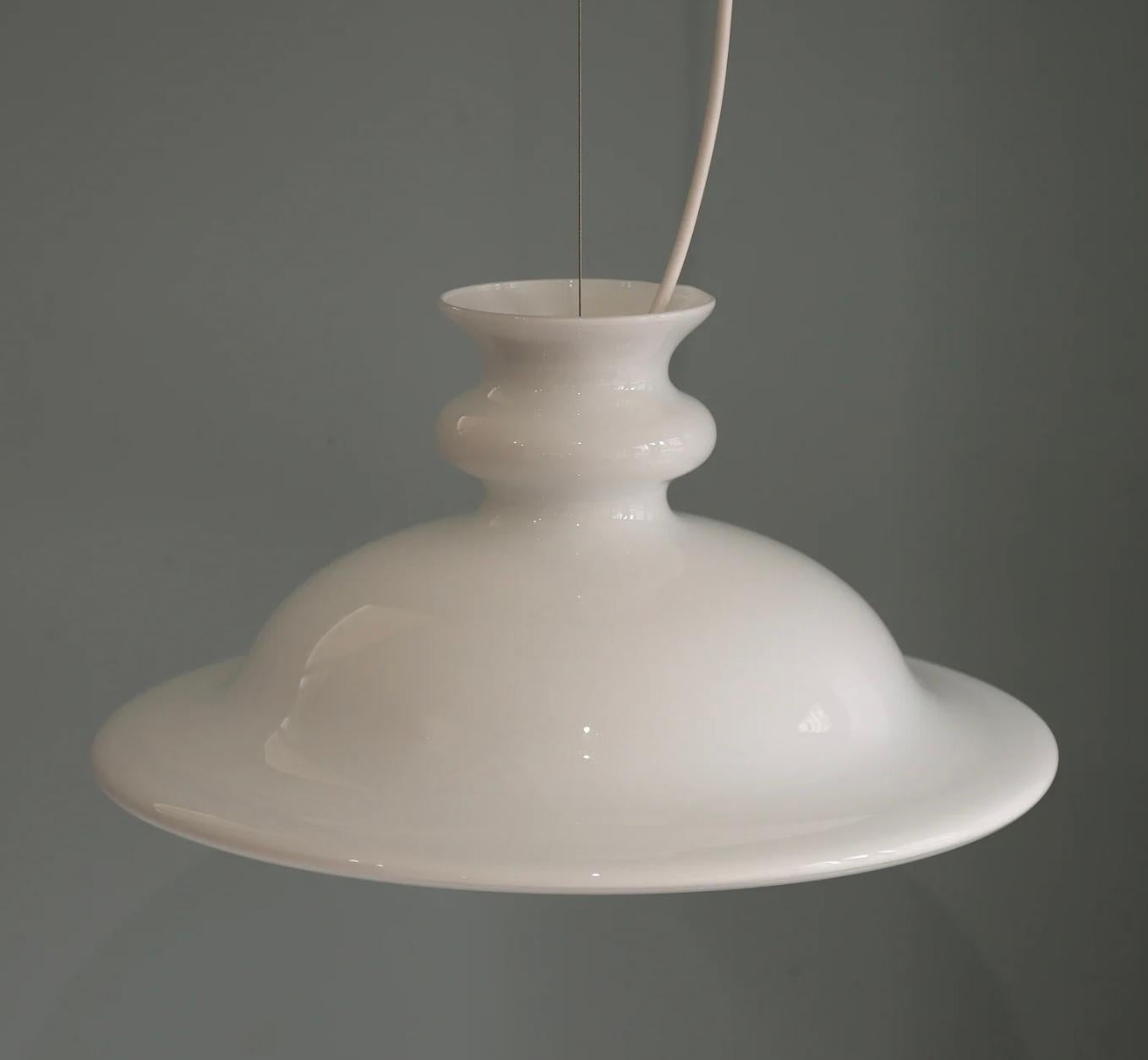 Vintage Danish  lamp by Sidse Werner for Holmegaard Tivoli series, 1980 Denmark.

Opal glass hanging lamp designed by Sidse Werner for Holmegaard from the early 1980s.

