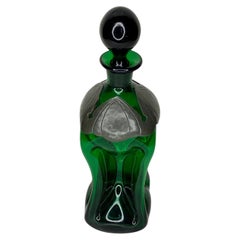 Decantador danés vintage Kluk Kluk verde de Holmegaard