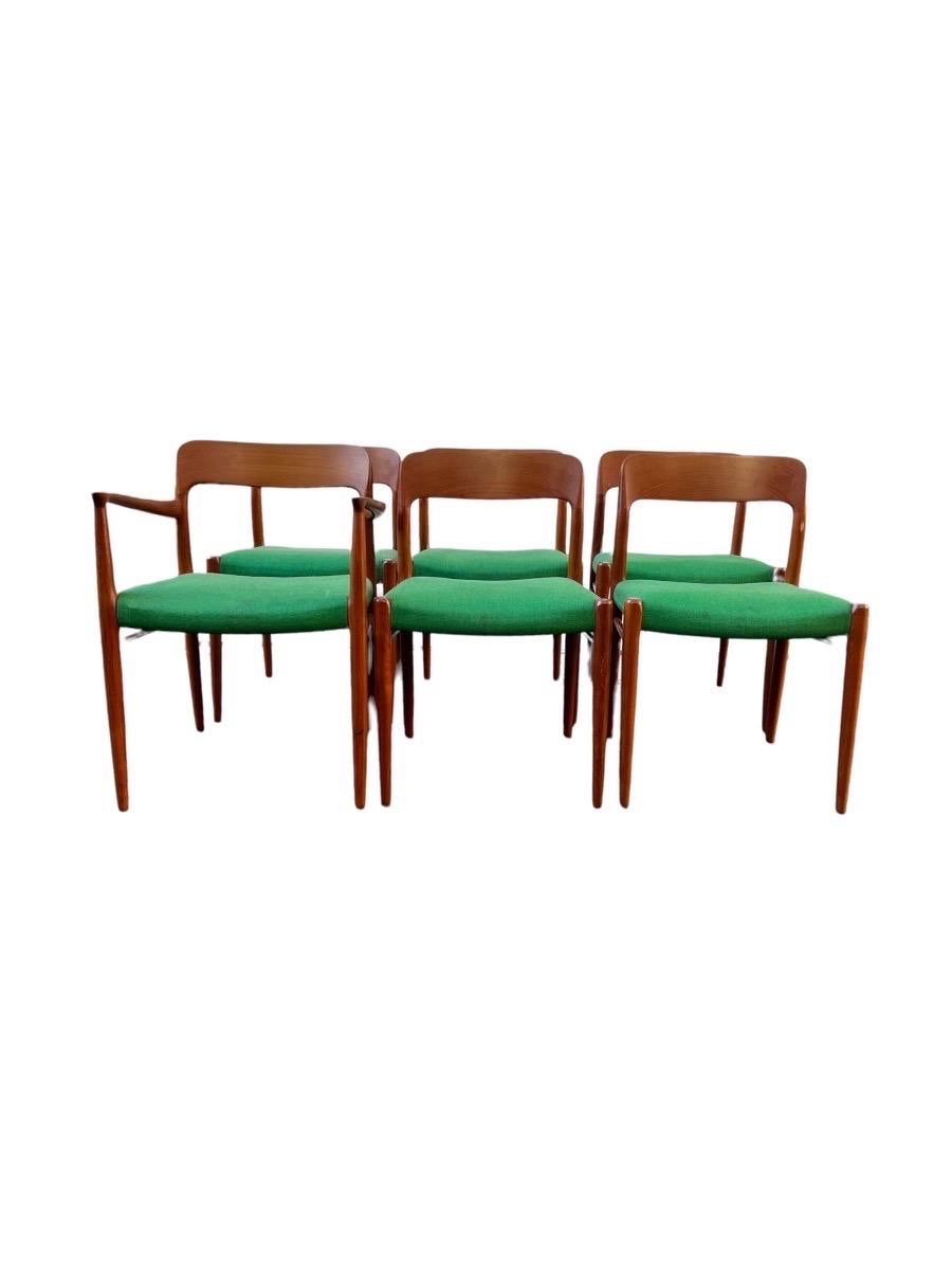 Vintage Danish Mid-Century Modern dining chairs by N.O Moller for JL Moller stamped. Set of 6.

Dimensions 
 Arm chair. 22 3/4 W ; 28 3/4 H ; 20 D
 Side chair. 20 W ; 28 3/4 H ; 19 D
 Seat height. 18.