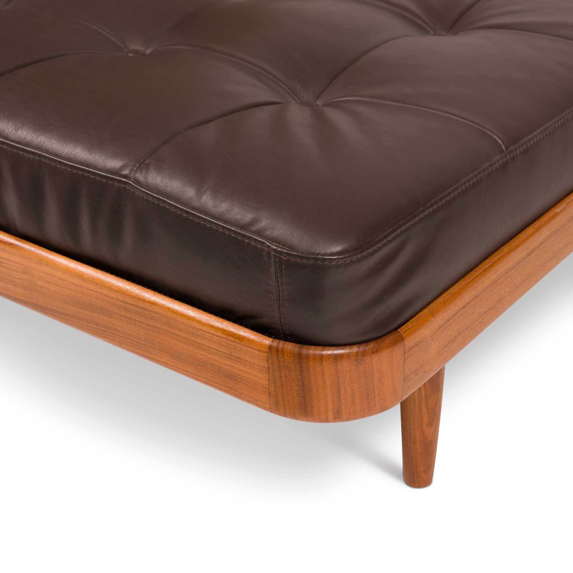 Immerse yourself in the epitome of Danish mid-century design with the Vintage Danish Mid-Century Solid Teak daybed from Horsnaes Møbler. Originating from Denmark circa 1956, this sophisticated daybed is a testament to exquisite craftsmanship and a
